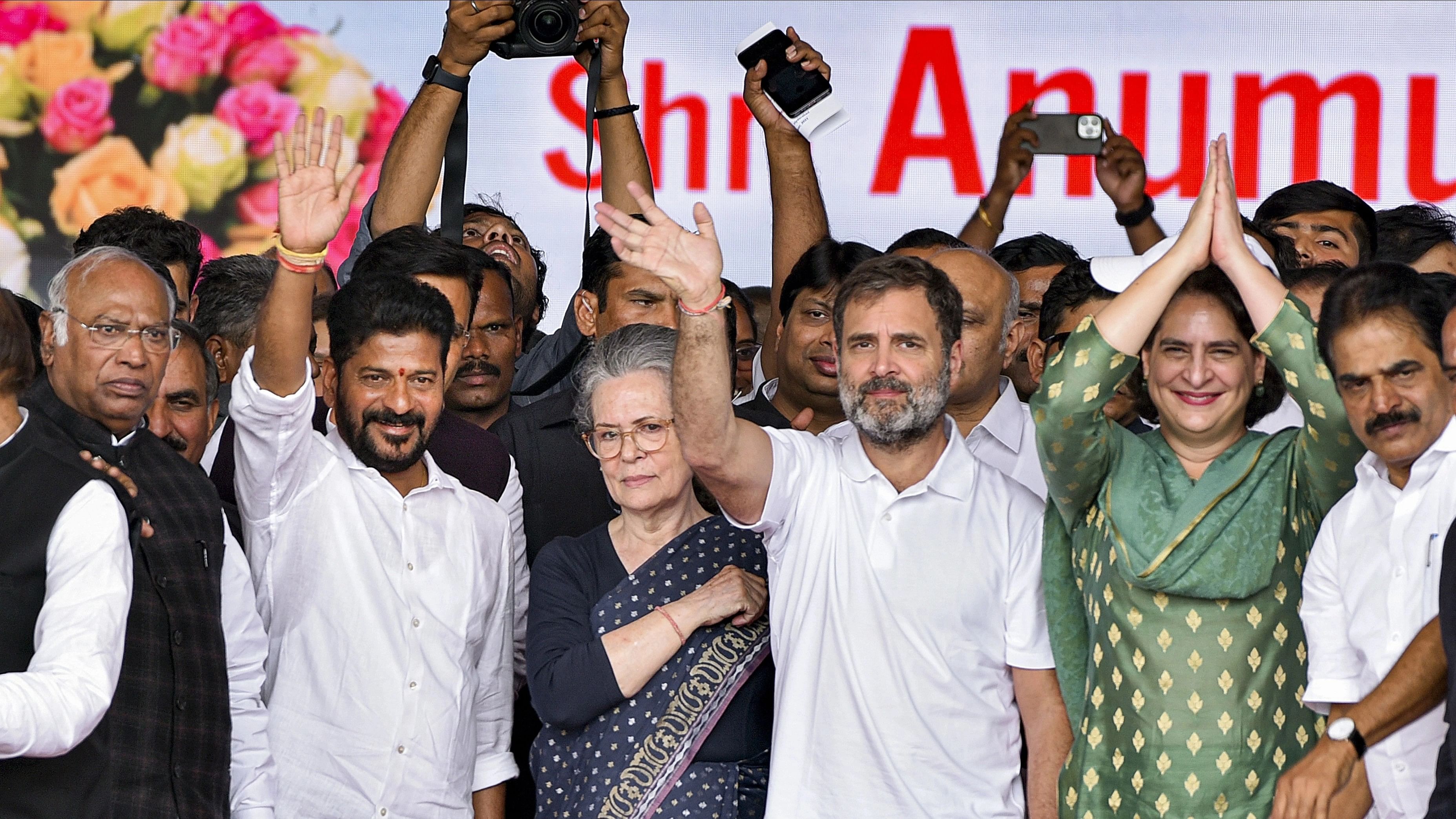 <div class="paragraphs"><p> Newly sworn-in Telangana CM A Revanth Reddy with Congress President Mallikarjun Kharge and party leaders Sonia Gandhi, Priyanka Gandhi, Rahul Gandhi and others during his oath-taking ceremony, in Hyderabad, Thursday, Dec 7, 2023. </p></div>