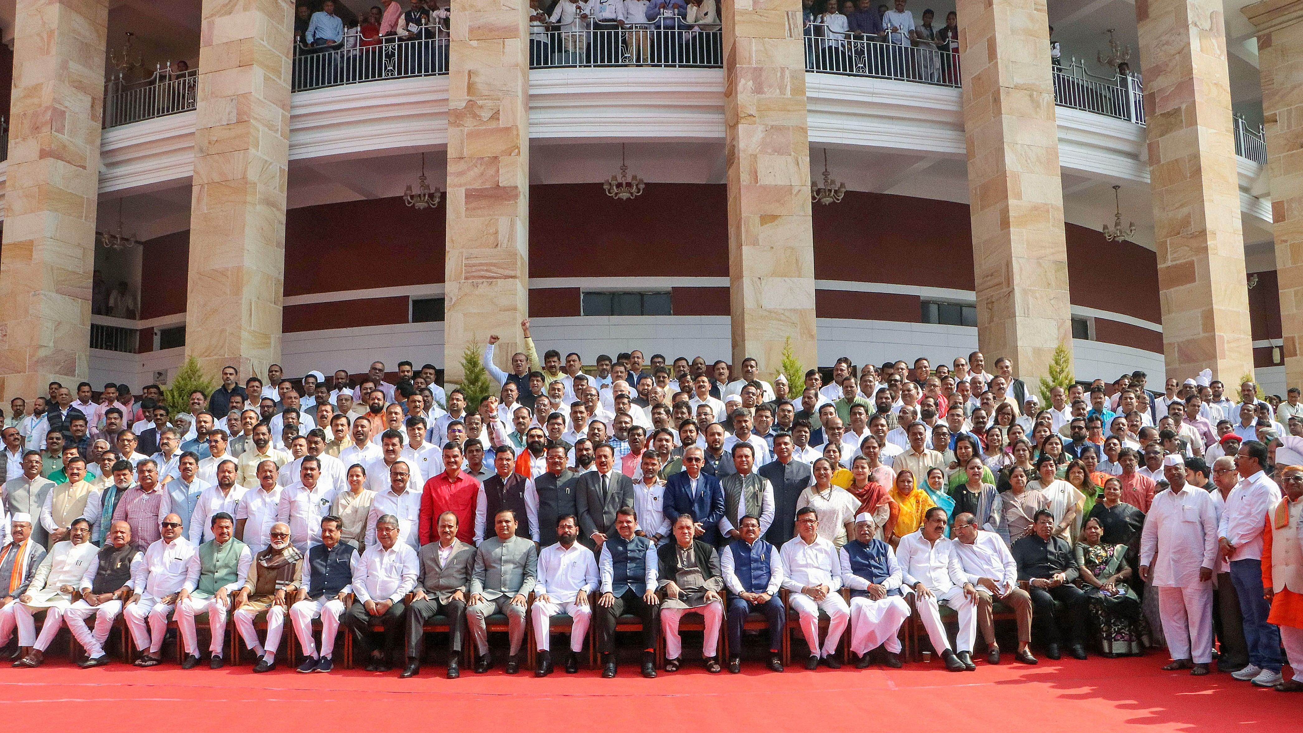 <div class="paragraphs"><p>Speaker of the Maharashtra Assembly Rahul Narwekar, Chief Minister Ekhnath Shinde, Deputy Chief Ministers Devendra Fadnavis and Ajit Pawar and MLAs during a group photo outside the Vidhan Bhavan during the Winter Session.</p></div>