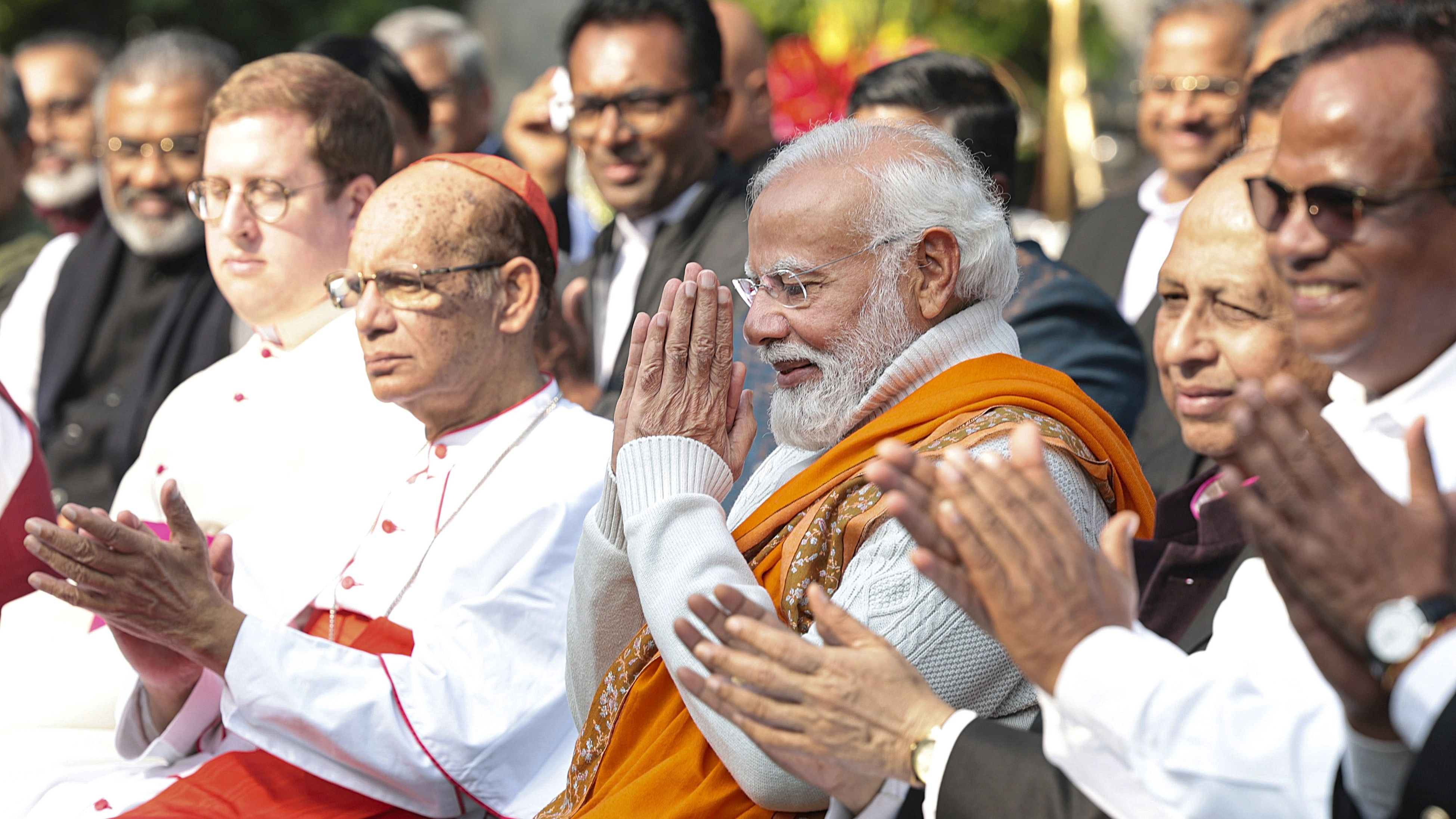 <div class="paragraphs"><p>Prime Minister Narendra Modi with Christian community members during Christmas celebrations.</p></div>