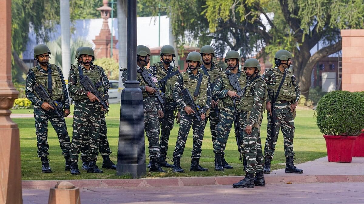 <div class="paragraphs"><p>Security personnel outside the Parliament House,</p></div>