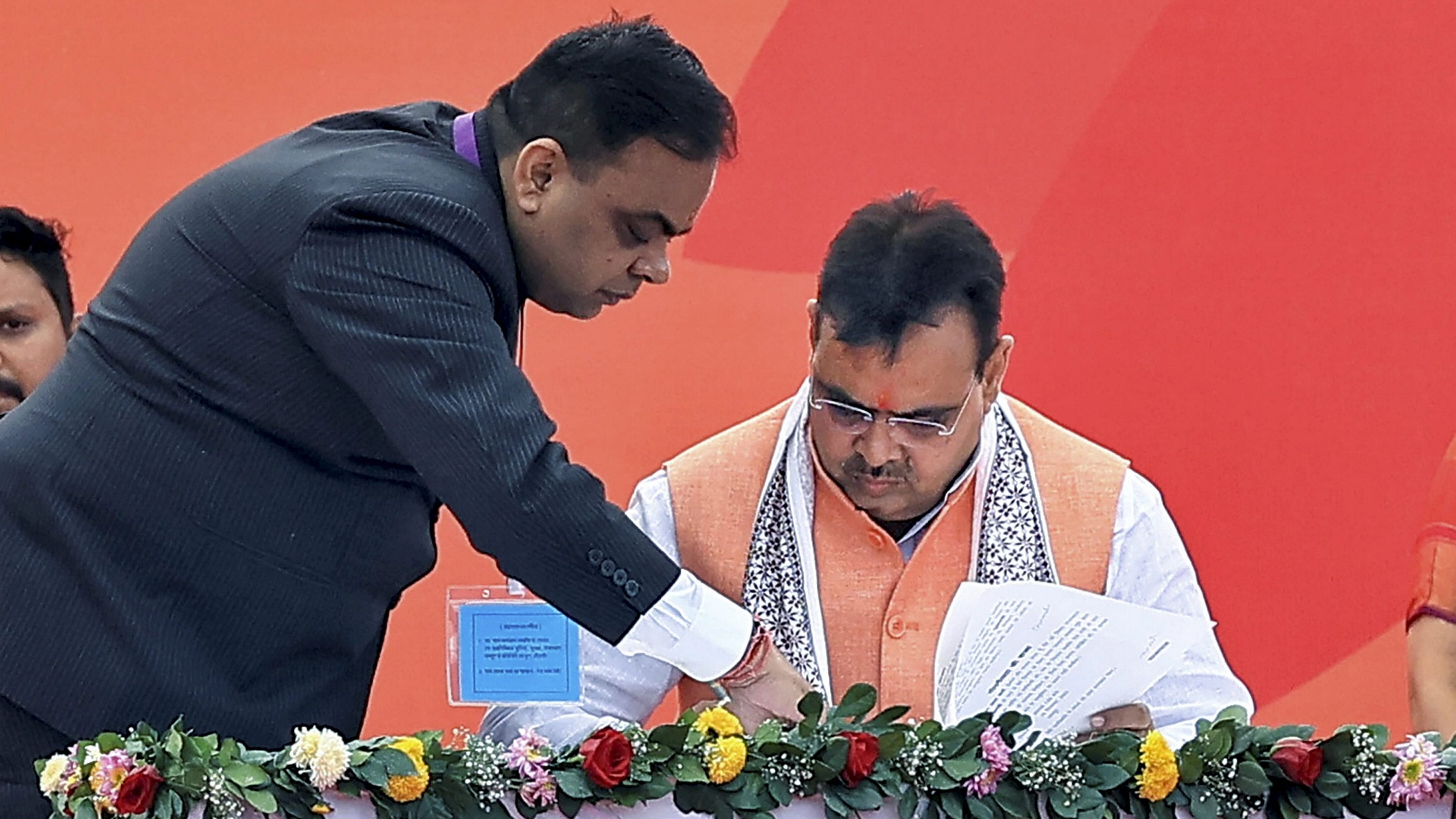 <div class="paragraphs"><p>Bhajan Lal Sharma signs after taking oath as Rajasthan's new Chief Minister.&nbsp;</p></div>