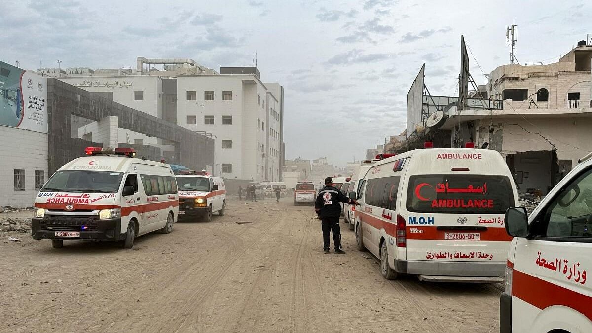 <div class="paragraphs"><p>Ambulances wait outside Al Shifa hospital which was raided by Israeli forces during Israel's ground operation, in Gaza City</p></div>