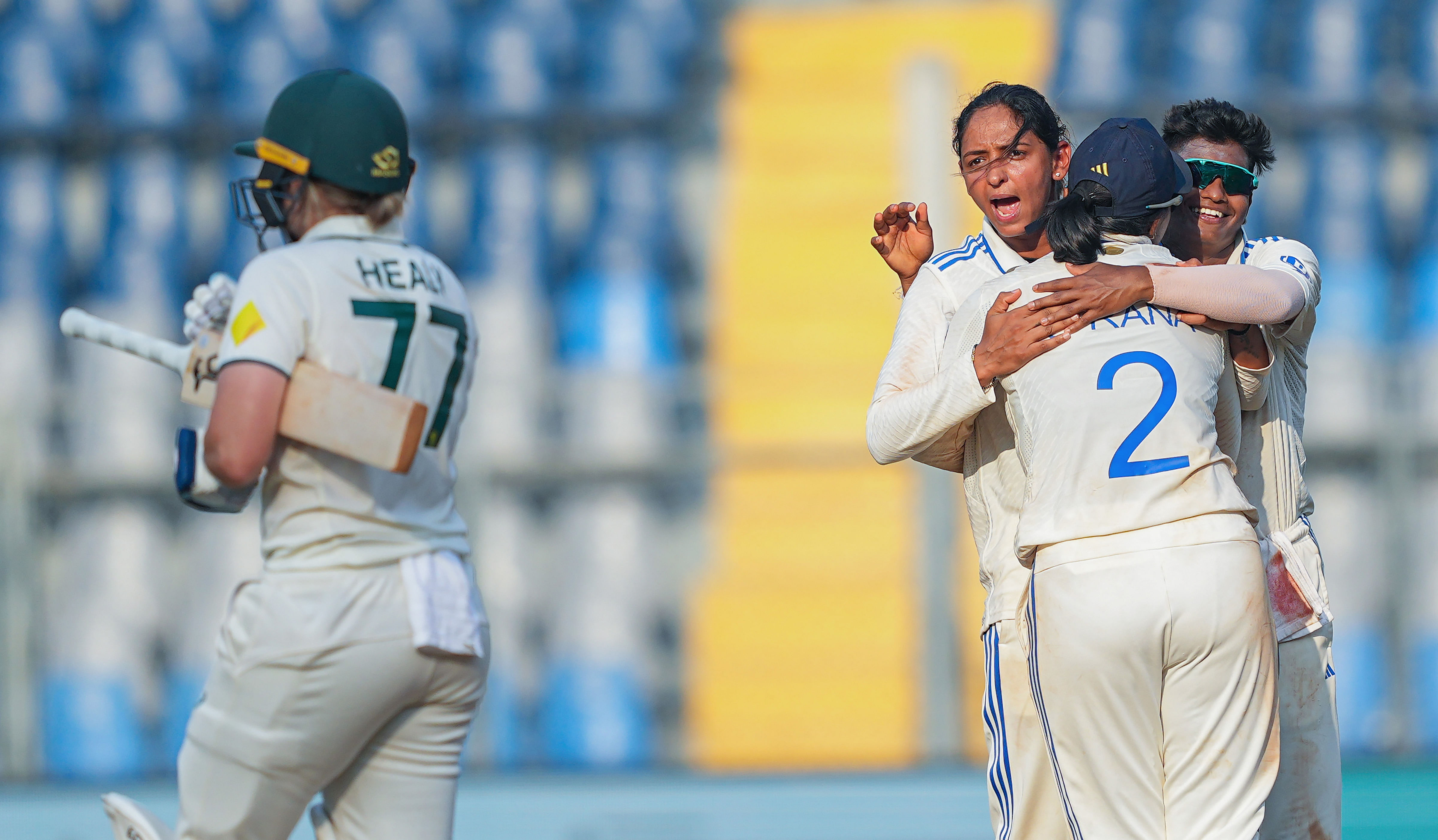 <div class="paragraphs"><p>India-Women's captain Harmanpreet Kaur celebrates with teammates after taking the wicket of Australia Womens captain Alyssa Healy on the third day of the one-off Test cricket match between India Women and Australia Women, at the Wankhede Stadium, in Mumbai, Saturday, Dec. 23, 2023. </p></div>