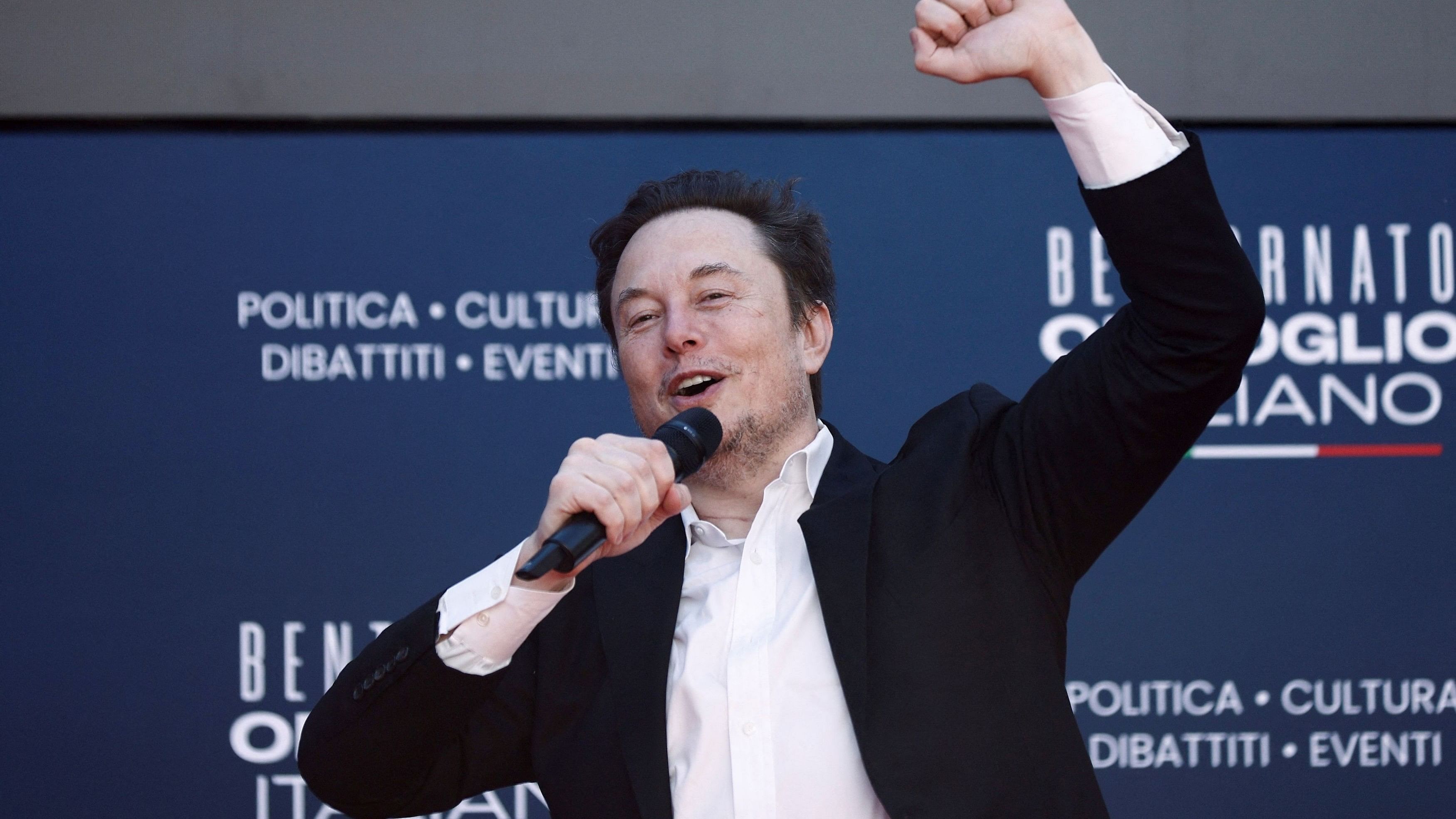 <div class="paragraphs"><p>Tesla and SpaceX's CEO Elon Musk gestures, as he attends political festival Atreju organised by Italian Prime Minister Giorgia Meloni's Brothers of Italy  right-wing party, in Rome, Italy, December 16, 2023. </p></div>