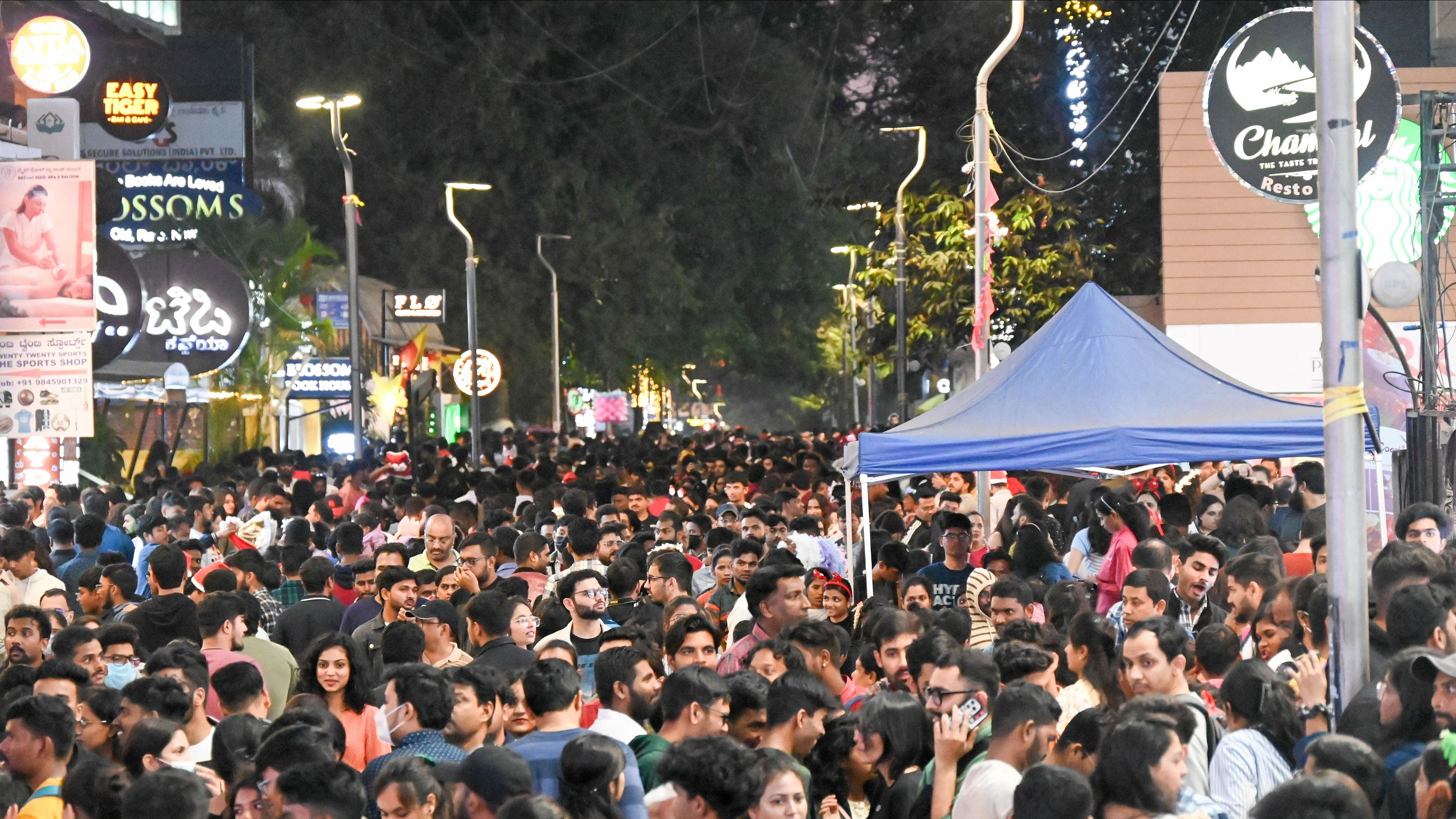 <div class="paragraphs"><p>People throngs Brigade Road and Church Street as festivities throng.</p></div>