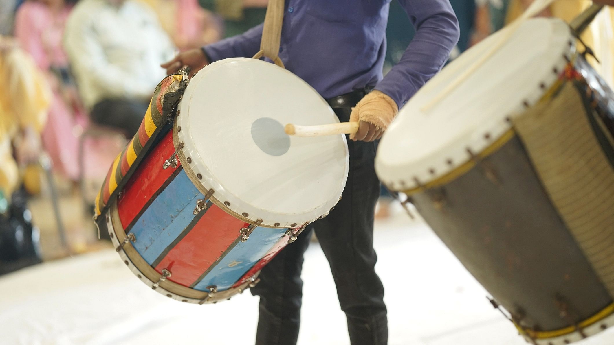 <div class="paragraphs"><p>Representative image of a person playing dhol.</p></div>