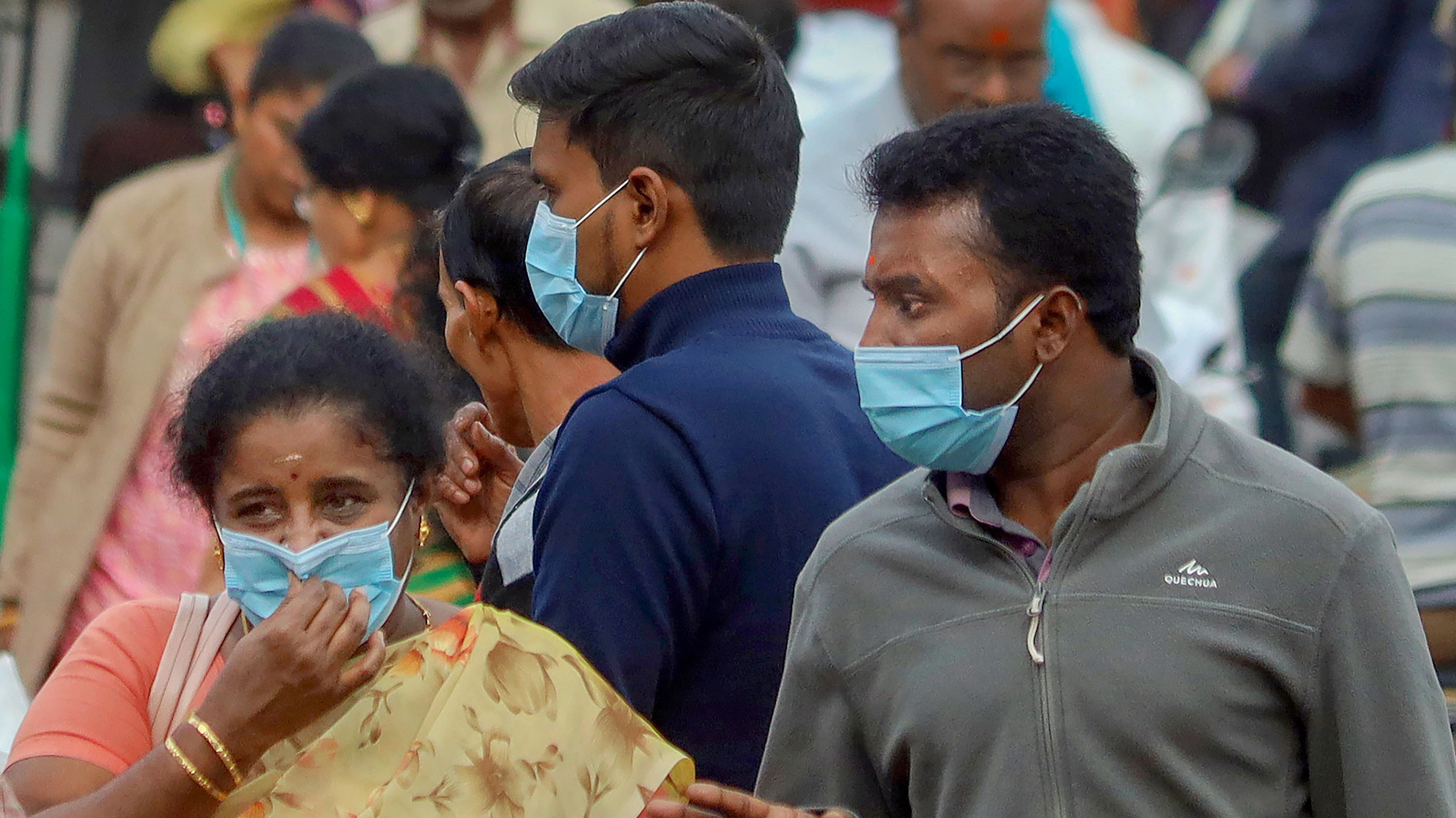 <div class="paragraphs"><p>Representative image showing people wearing masks</p></div>