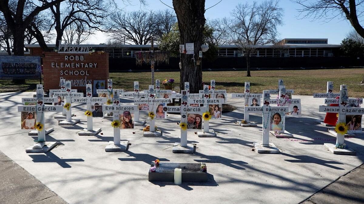 <div class="paragraphs"><p>Memorial crosses stand in front of Robb Elementary School, as U.S. Attorney General Merrick Garland announces the results of a review into the law enforcement response to a 2022 mass shooting in Uvalde, Texas, US, January 18, 2024.</p></div>