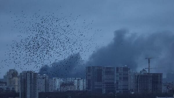 Russian Air Strikes On Kyiv And Kharkiv Kill Two, Wound Dozens ...