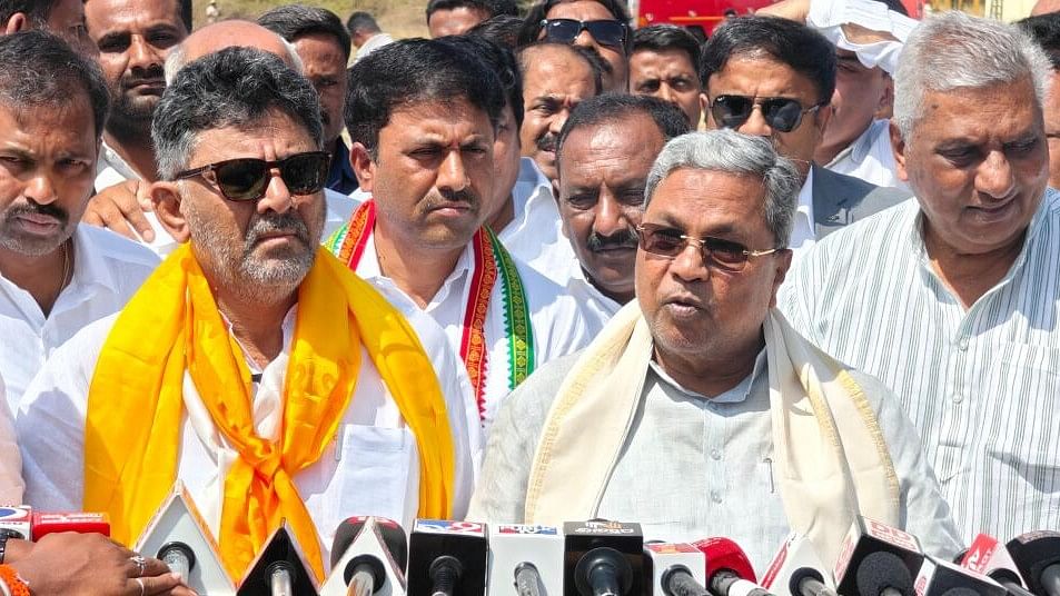 <div class="paragraphs"><p>CM Siddaramaiah and his deputy D K Shivakumar interact with media persons at the helipad of&nbsp; 'Central School for Tibetans' ground at Bylakuppe&nbsp;camp 1 of Periyapatna&nbsp;of Mysuru district.&nbsp;</p></div>