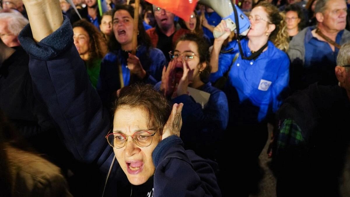 <div class="paragraphs"><p>Families of hostages and supporters shout slogans as they protest to call for the release of hostages kidnapped on the deadly October 7 attack by Palestinian Islamist group Hamas, in Tel Aviv, Israel, January 6, 2024.</p></div>