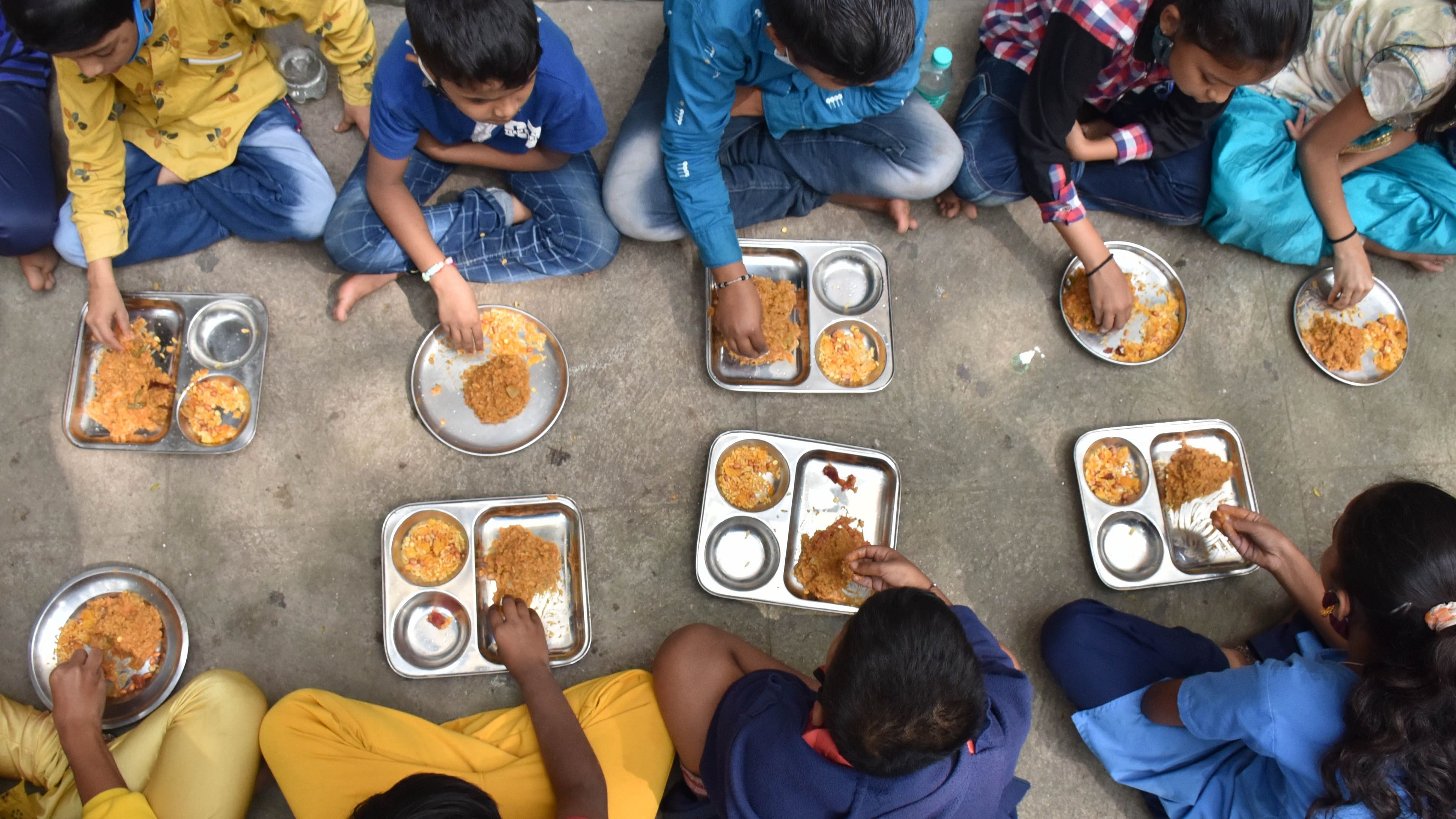 <div class="paragraphs"><p>In the past, governments have sought to stop giving eggs to schoolchildren as part of the midday meal scheme. In pic, children receive their midday meals at a government school. </p></div>