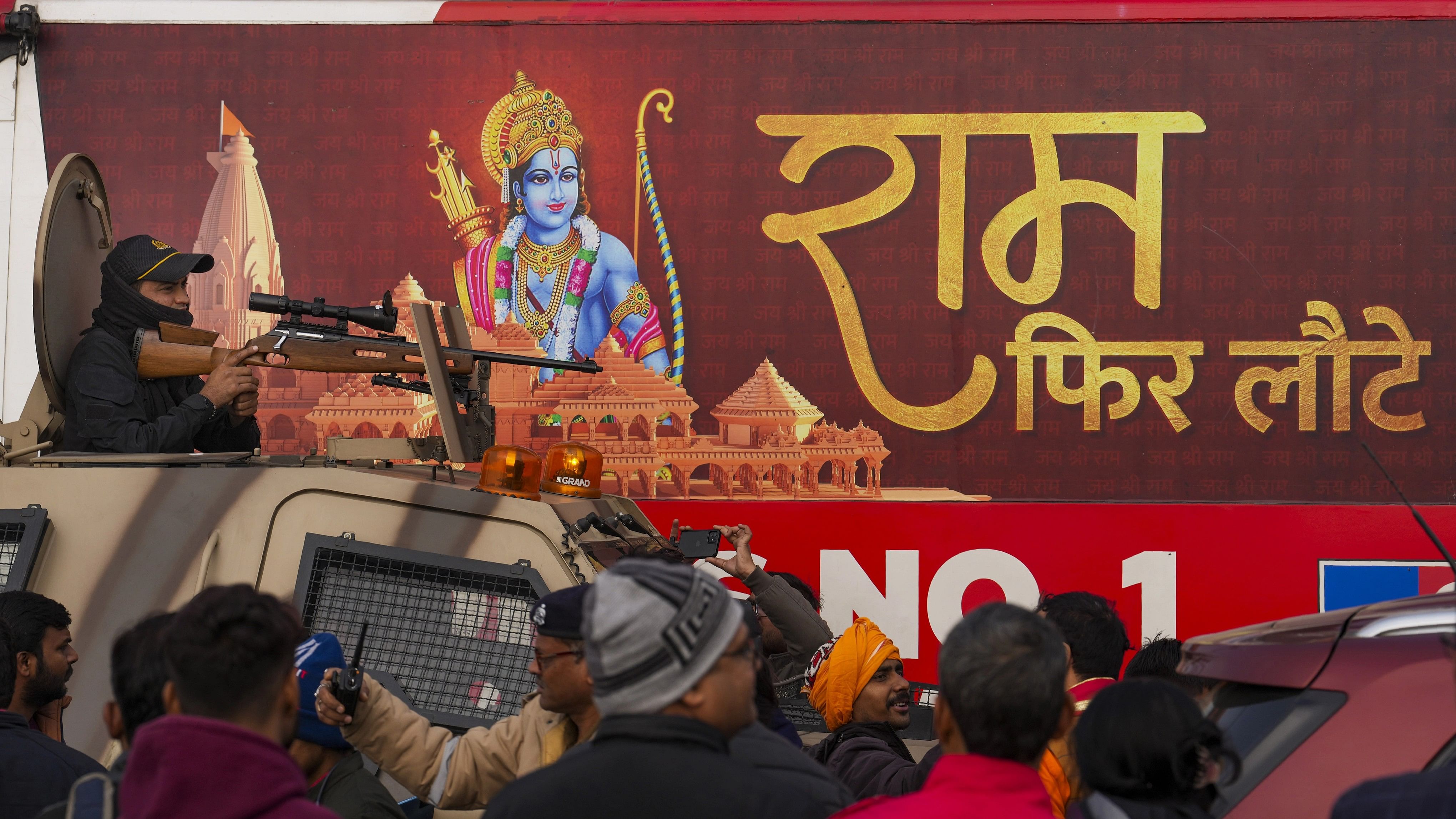 <div class="paragraphs"><p> A security personnel in an armoured vehicles keeps vigil ahead of the consecration ceremony of Ram Mandir, in Ayodhya.</p></div>
