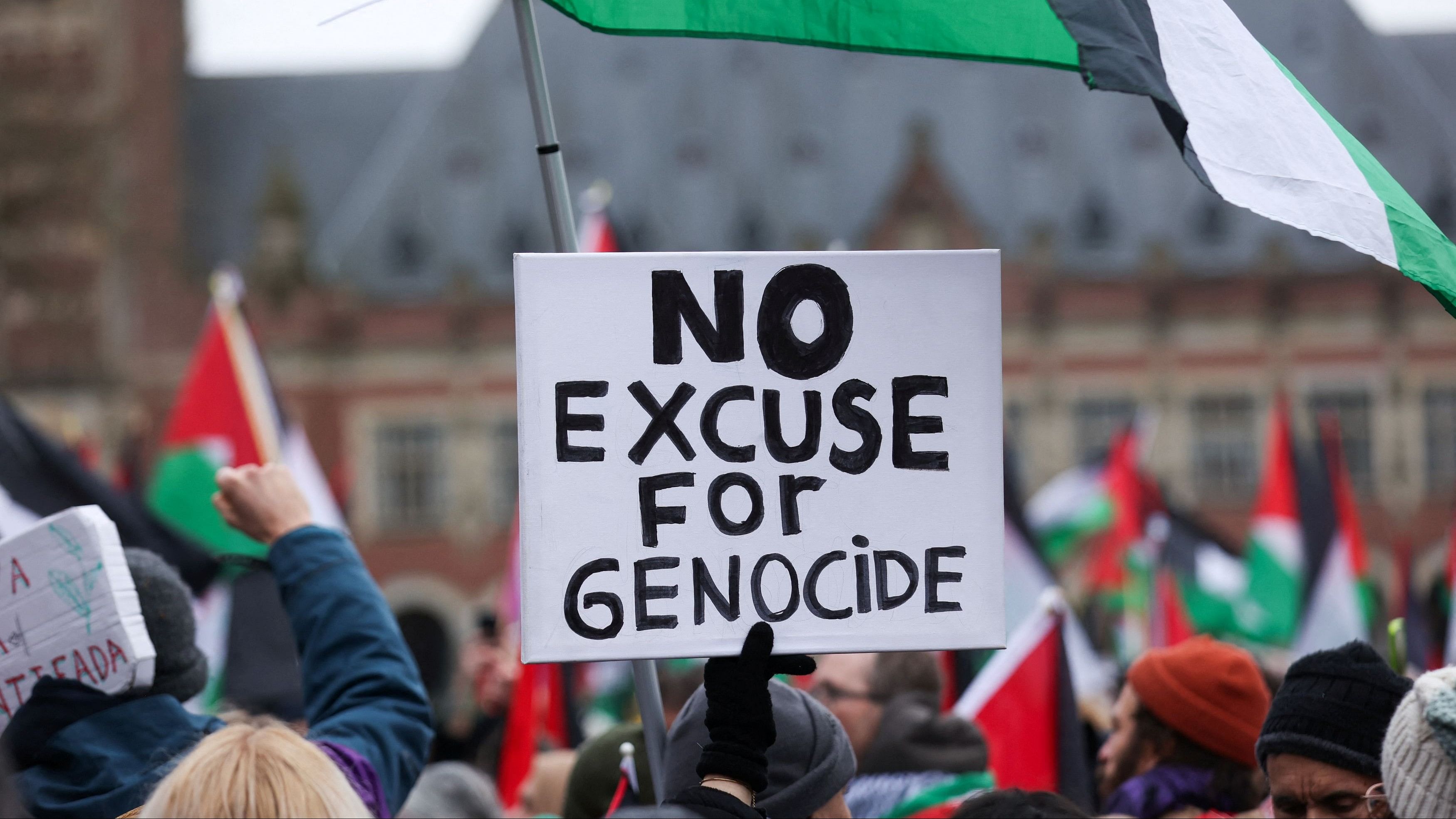 <div class="paragraphs"><p>A photo showing protests near the ICJ in the Hague as Israel and South Africa face each other in the Gaza genocide case.</p></div>