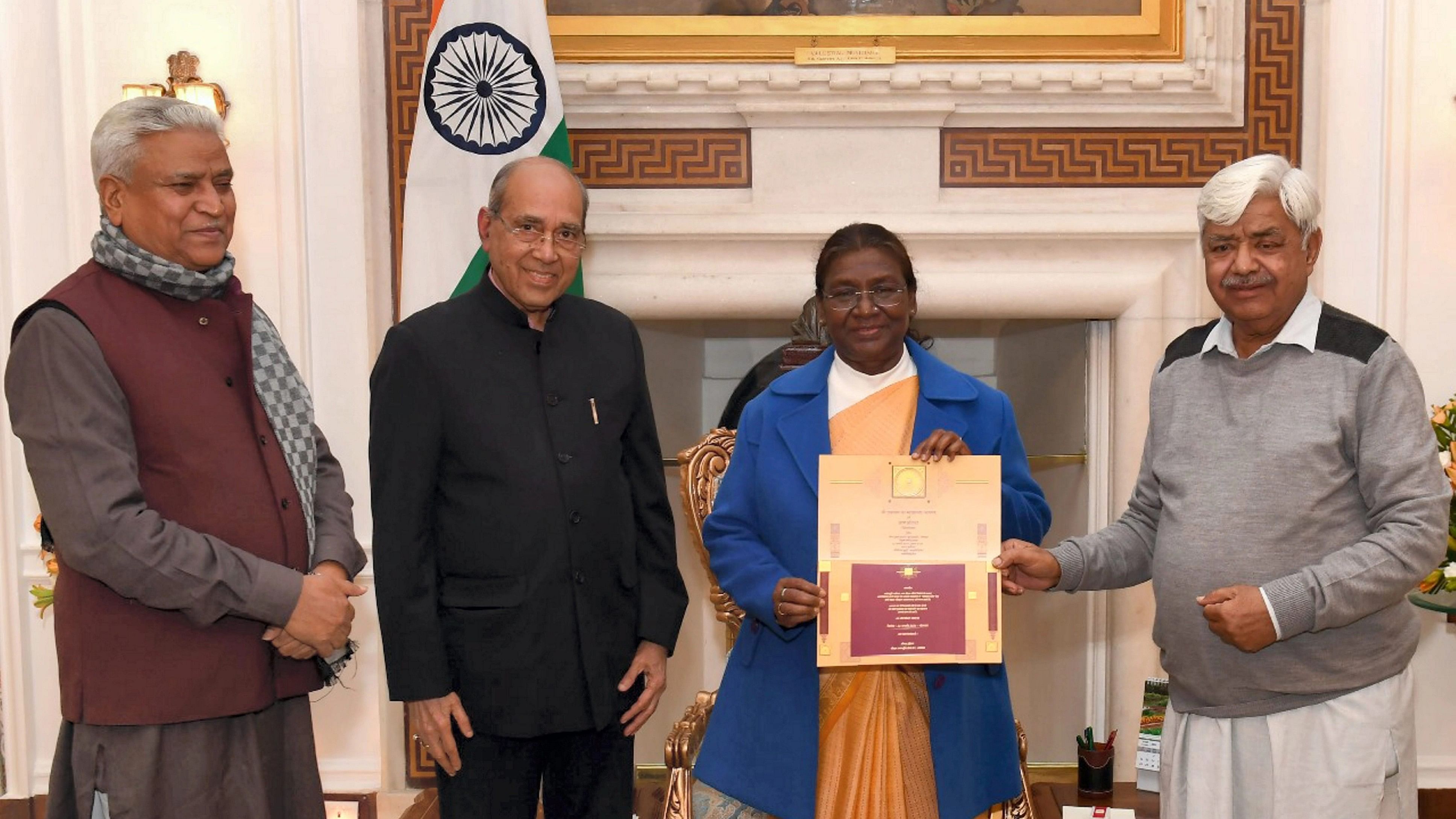 <div class="paragraphs"><p>President Droupadi Murmu receives an invitation for the Ram temple consecration ceremony from VHP leaders.</p></div>