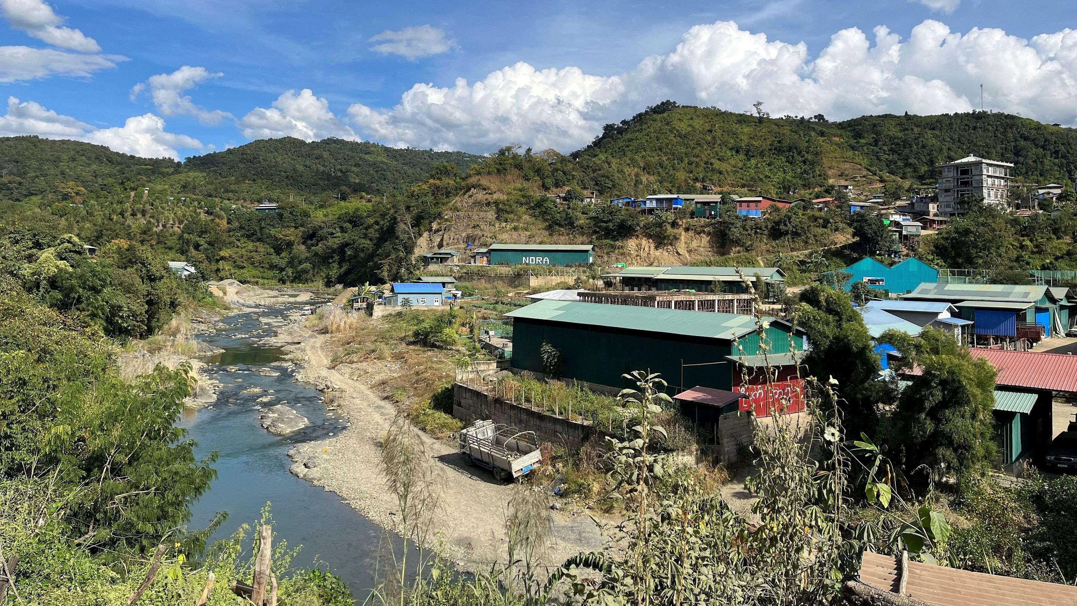 <div class="paragraphs"><p>A view of Myanmar's Khawmawi village on the India-Myanmar border across the Tiau river as seen from Zokhawthar village in Champhai district of India's northeastern state of Mizoram, India.</p></div>