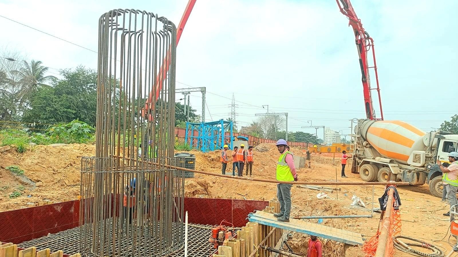 <div class="paragraphs"><p>Concrete is being poured into a pile cap at Hebbal on the Bengaluru Suburban Railway Project’s Corridor 2, the only line where groundwork has begun. </p></div>