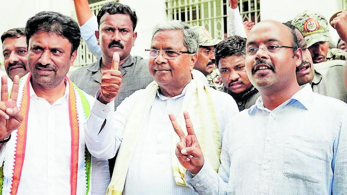 <div class="paragraphs"><p>Chief Minister Siddaramaiah, seen here with his son, Yathindra (right).</p></div>