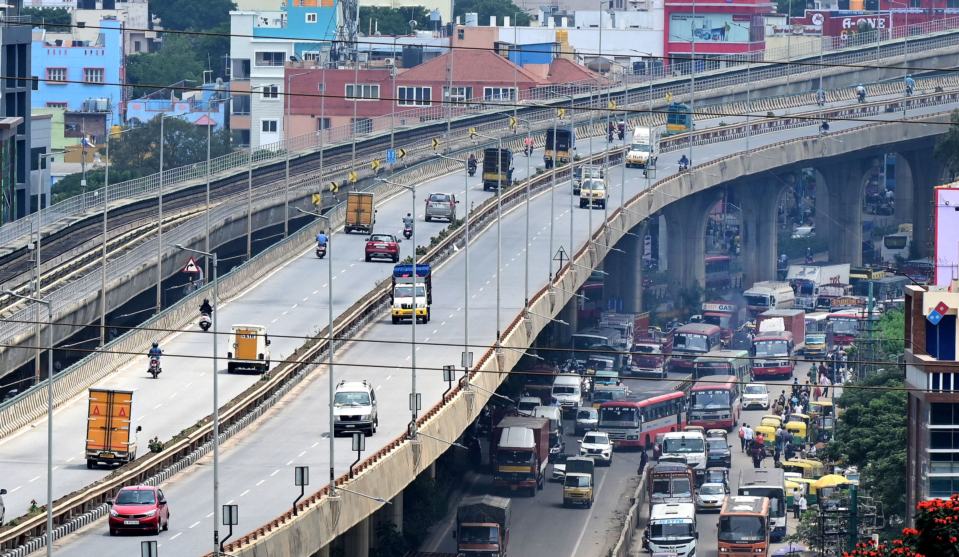 <div class="paragraphs"><p>With heavy vehicles not allowed on the Peenya flyover, the road below sees daily traffic jams. </p></div>