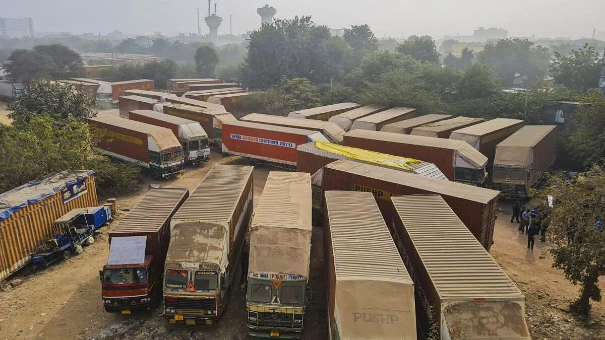 <div class="paragraphs"><p>Trucks parked at a ground amid a strike of drivers over new provisions regarding hit-and-run cases under Bharatiya Nyaya Sanhita, in Gurugram.</p></div>