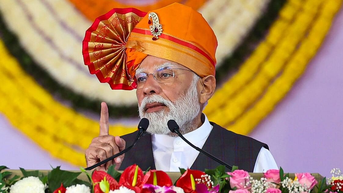 <div class="paragraphs"><p>Prime Minister Narendra Modi speaks during foundation stone laying and dedication of various projects in Solapur, Maharashtra.</p></div>