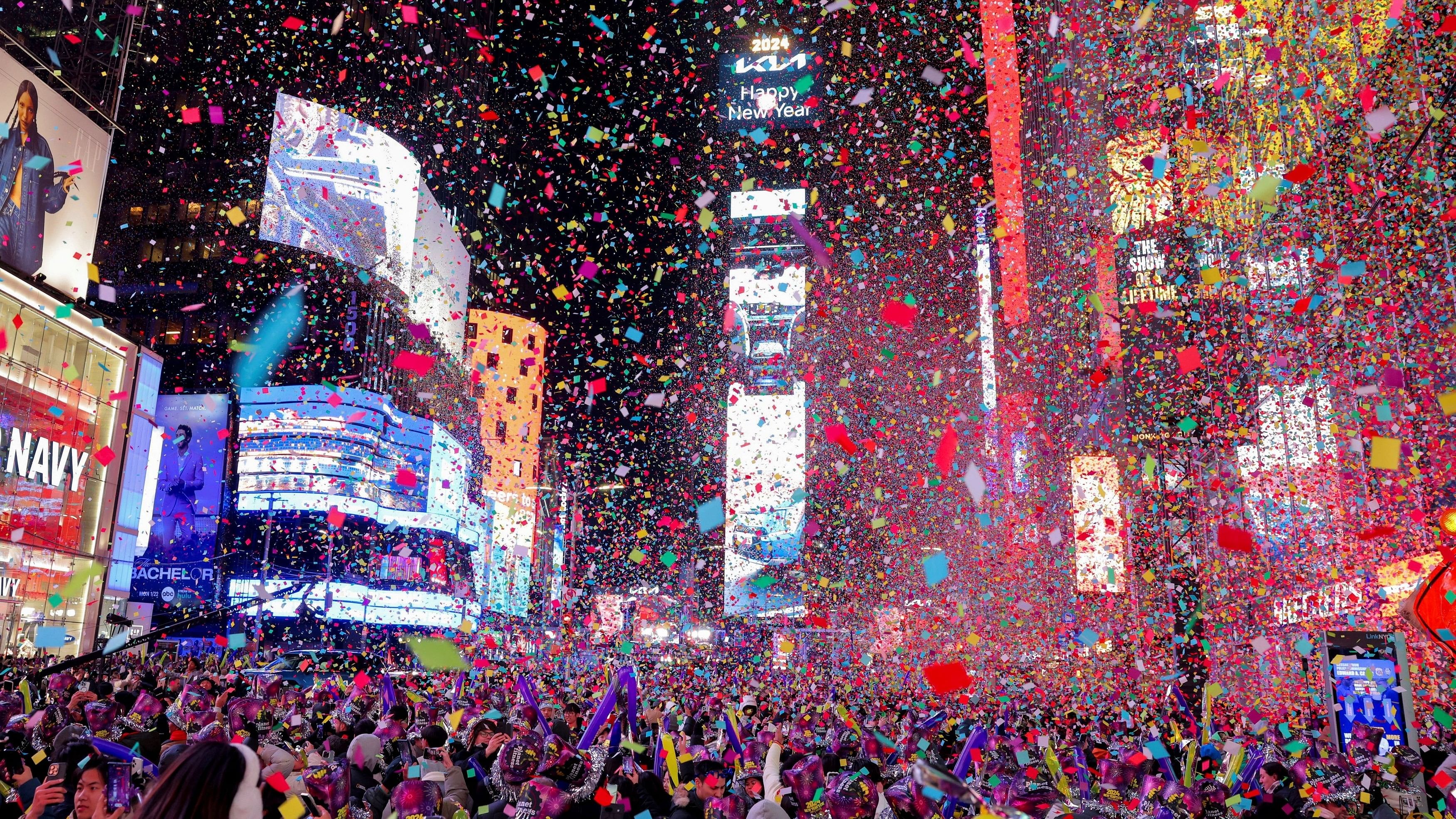 <div class="paragraphs"><p>People watch confetti flying around after the clock strikes midnight during New Year celebrations at Times Square, in New York City, New York, U.S., January 1, 2024.</p></div>