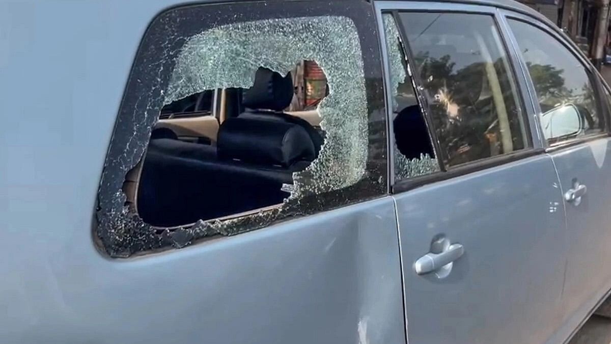 <div class="paragraphs"><p>Damaged window glass of a car which was allegedly damaged by the supporters of TMC leader Sheikh Sajahan during a raid by the ED officials at his residence, in North 24 Parganas district.&nbsp;</p></div>