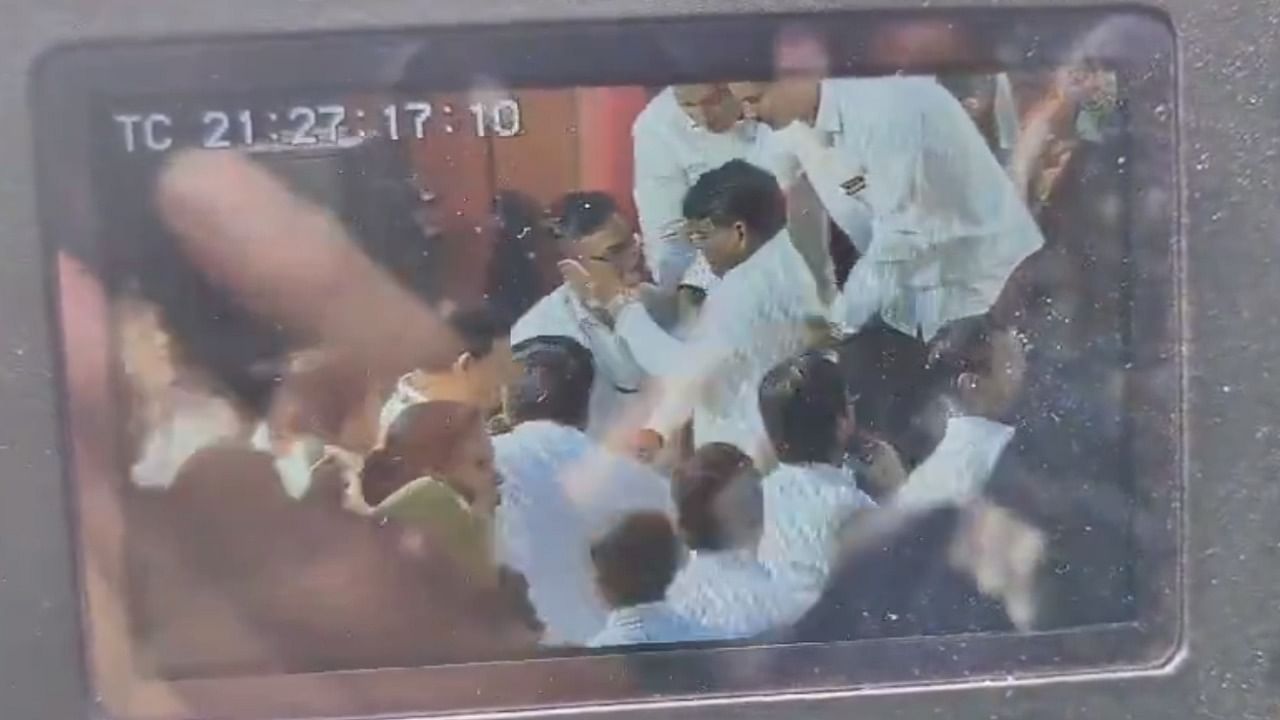 <div class="paragraphs"><p>Screengrab from the viral video showing the BJP MLA hitting a policeman</p></div>