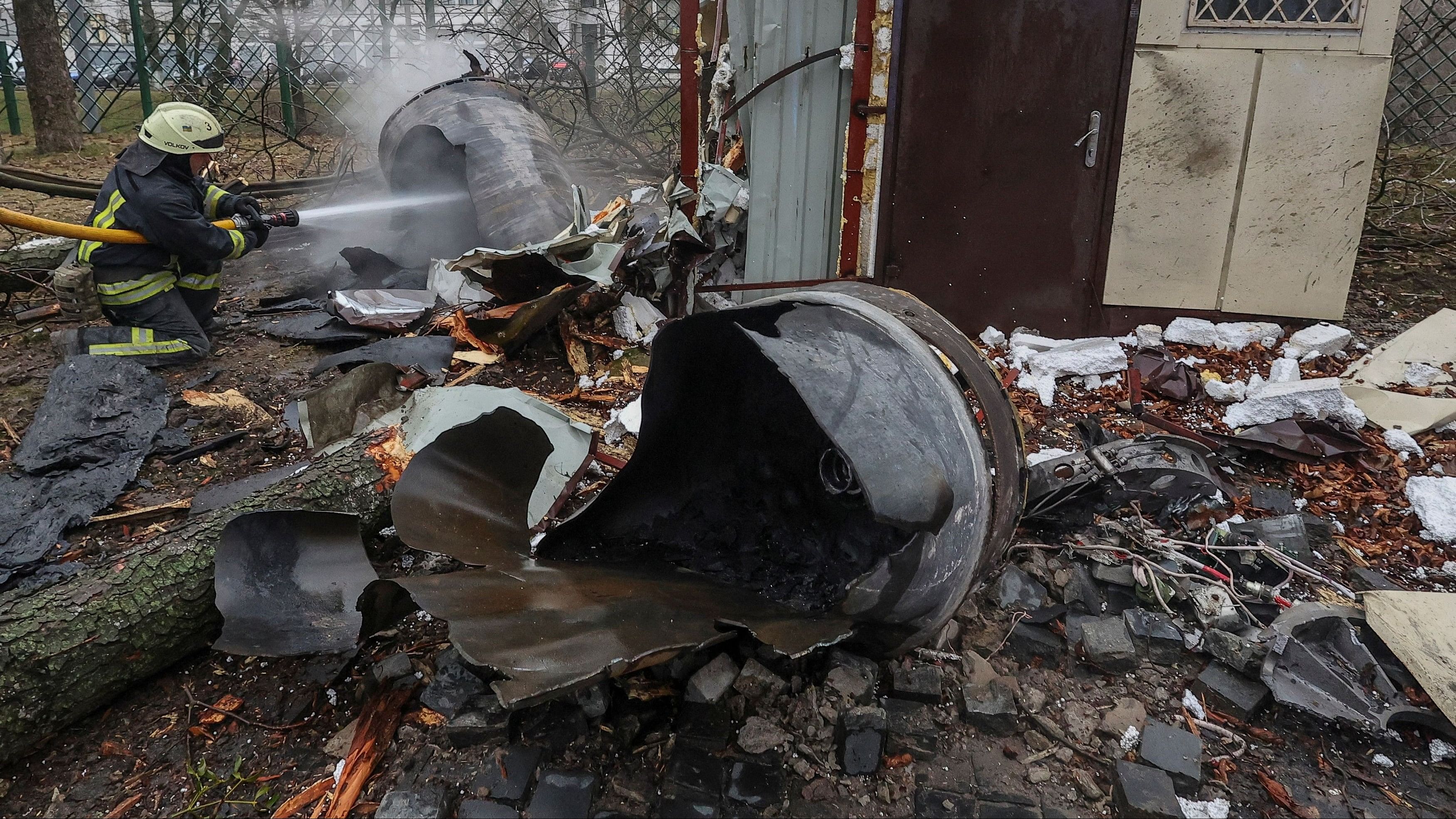 <div class="paragraphs"><p>A firefighter extinguishes remains of an unidentified missile, which Ukrainian authorities claimed to be made in North Korea, at a site of a Russian strike, amid Russia's attack on Ukraine, in Kharkiv, Ukraine January 2, 2024.</p></div>