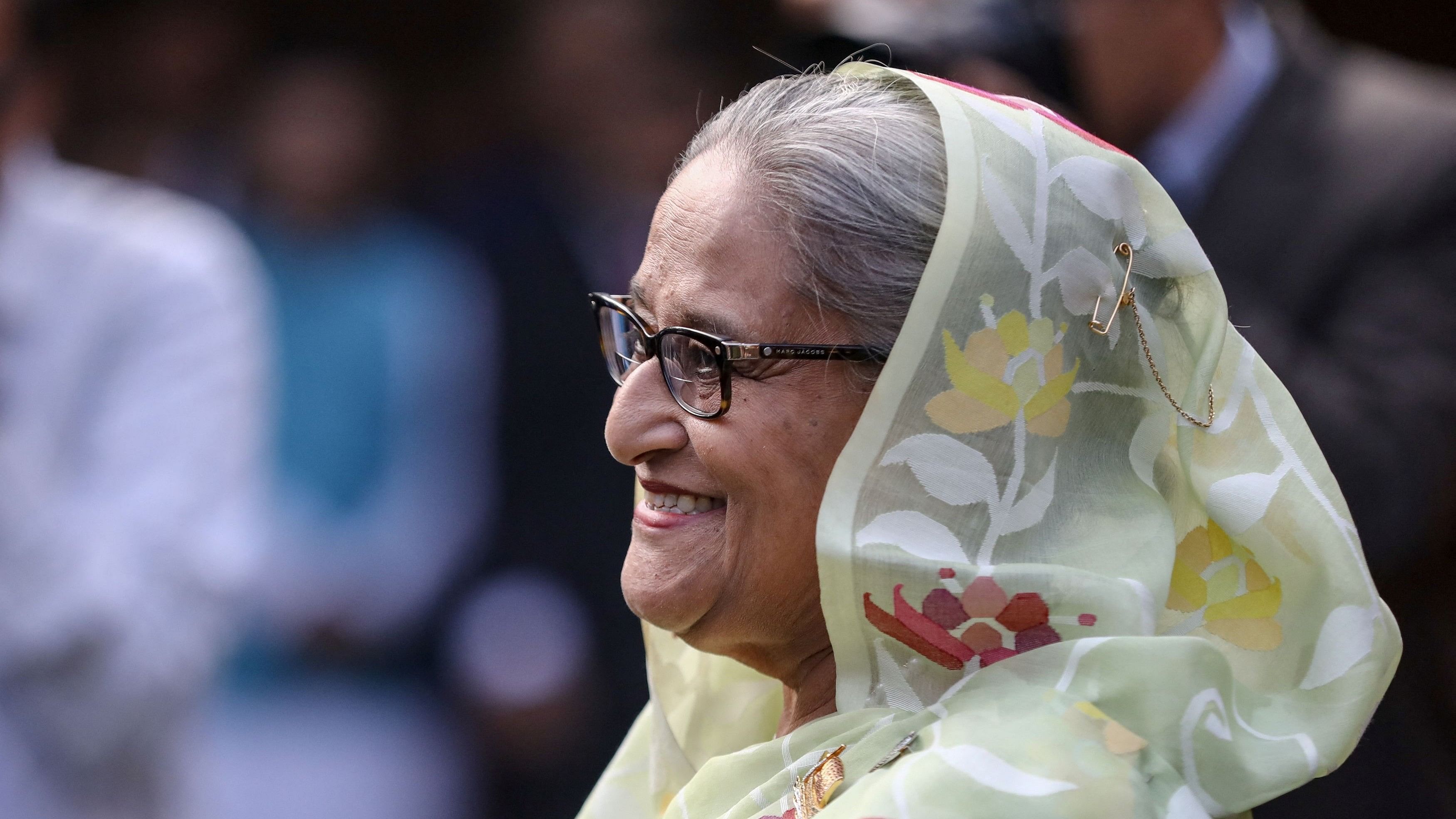<div class="paragraphs"><p>Sheikh Hasina, Prime Minister of Bangladesh and Chairperson of Bangladesh Awami League, reacts as she arrives for the meeting with foreign observers and journalists at the Prime Minister's residence in Dhaka, Bangladesh, January 8, 2024. </p></div>