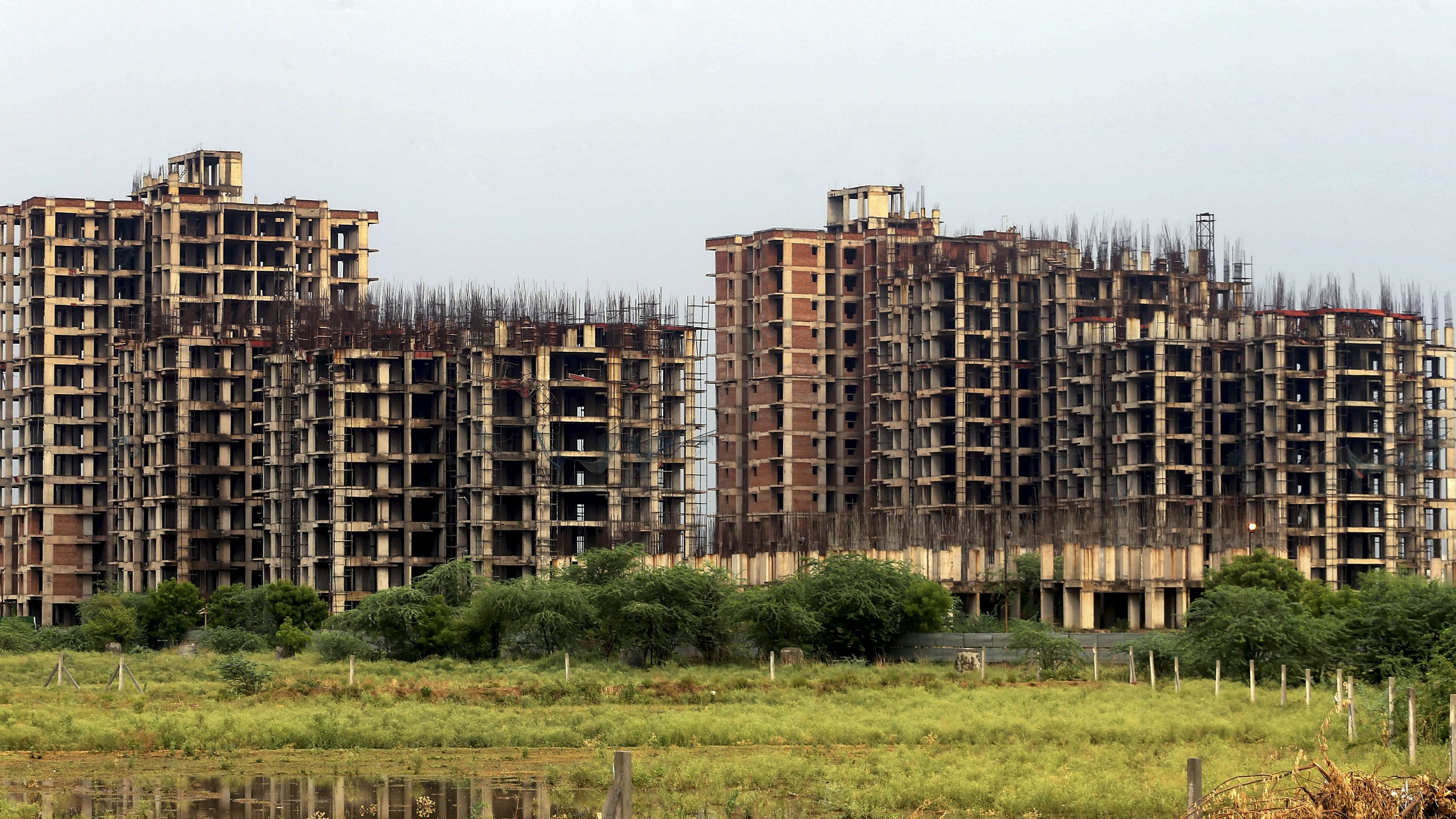 <div class="paragraphs"><p>Noida: Construction work underway at a residential site, in Noida, Friday, July 5, 2019. </p></div>