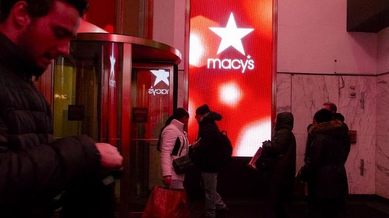 <div class="paragraphs"><p>Customers outside a Macy's shop.</p></div>