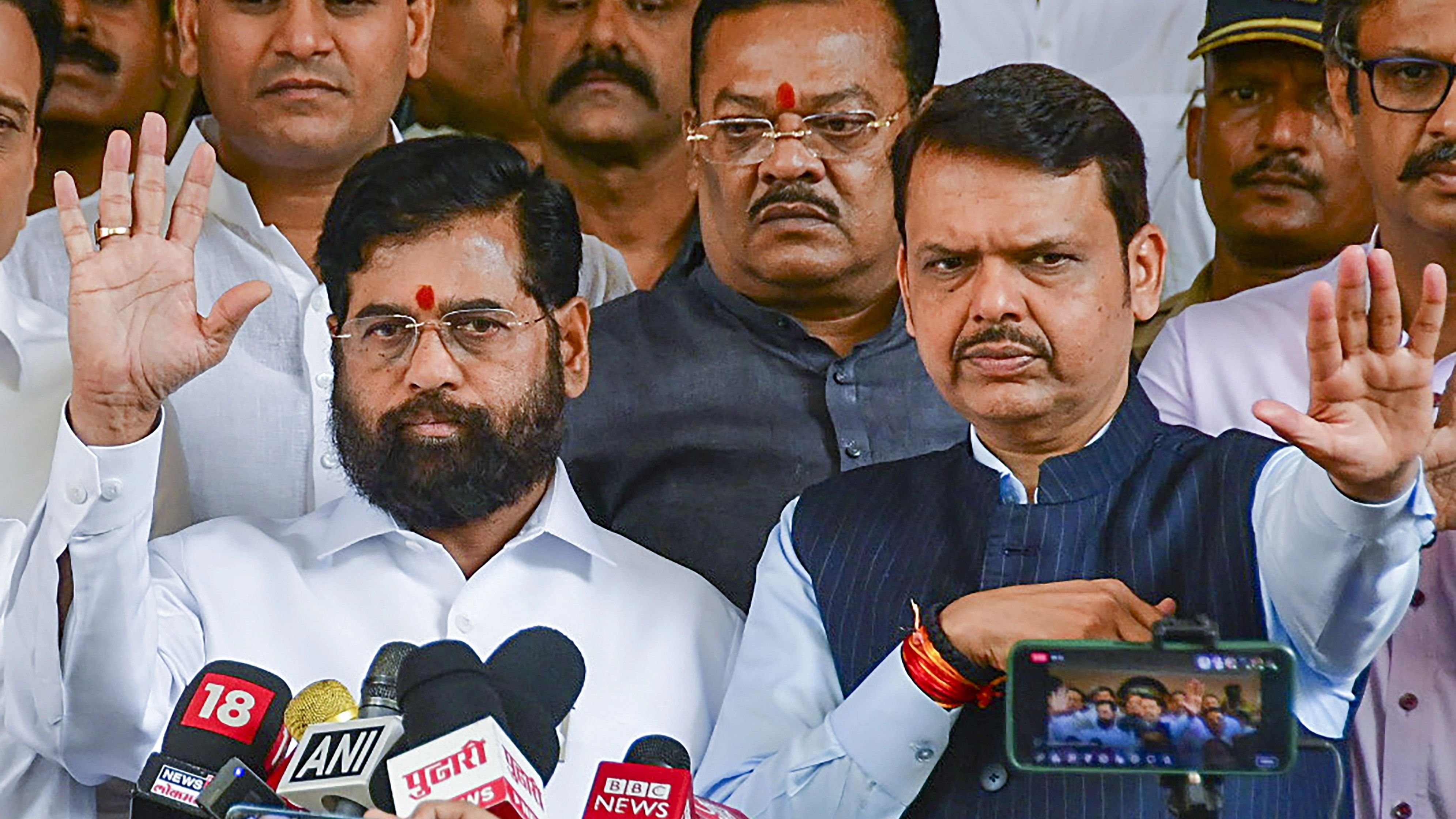 <div class="paragraphs"><p>Maharashtra Chief Minister Eknath Shinde with Deputy Chief Minister Devendra Fadnavis addresses the media after all-party meeting on Maratha reservation, in Mumbai, in November last year.</p></div>