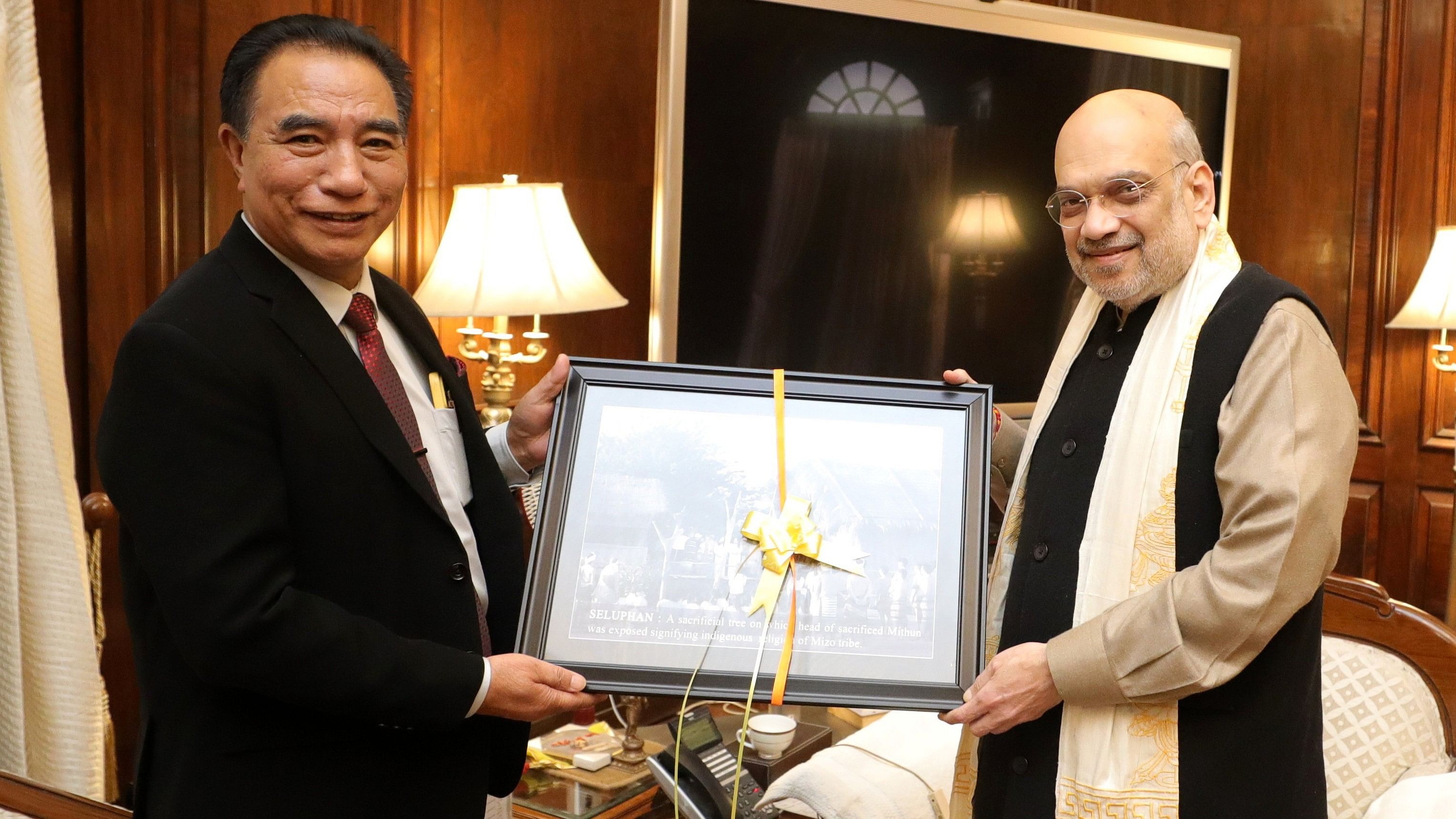 <div class="paragraphs"><p>Amit Shah with Mizoram CM Lalduhoma</p></div>