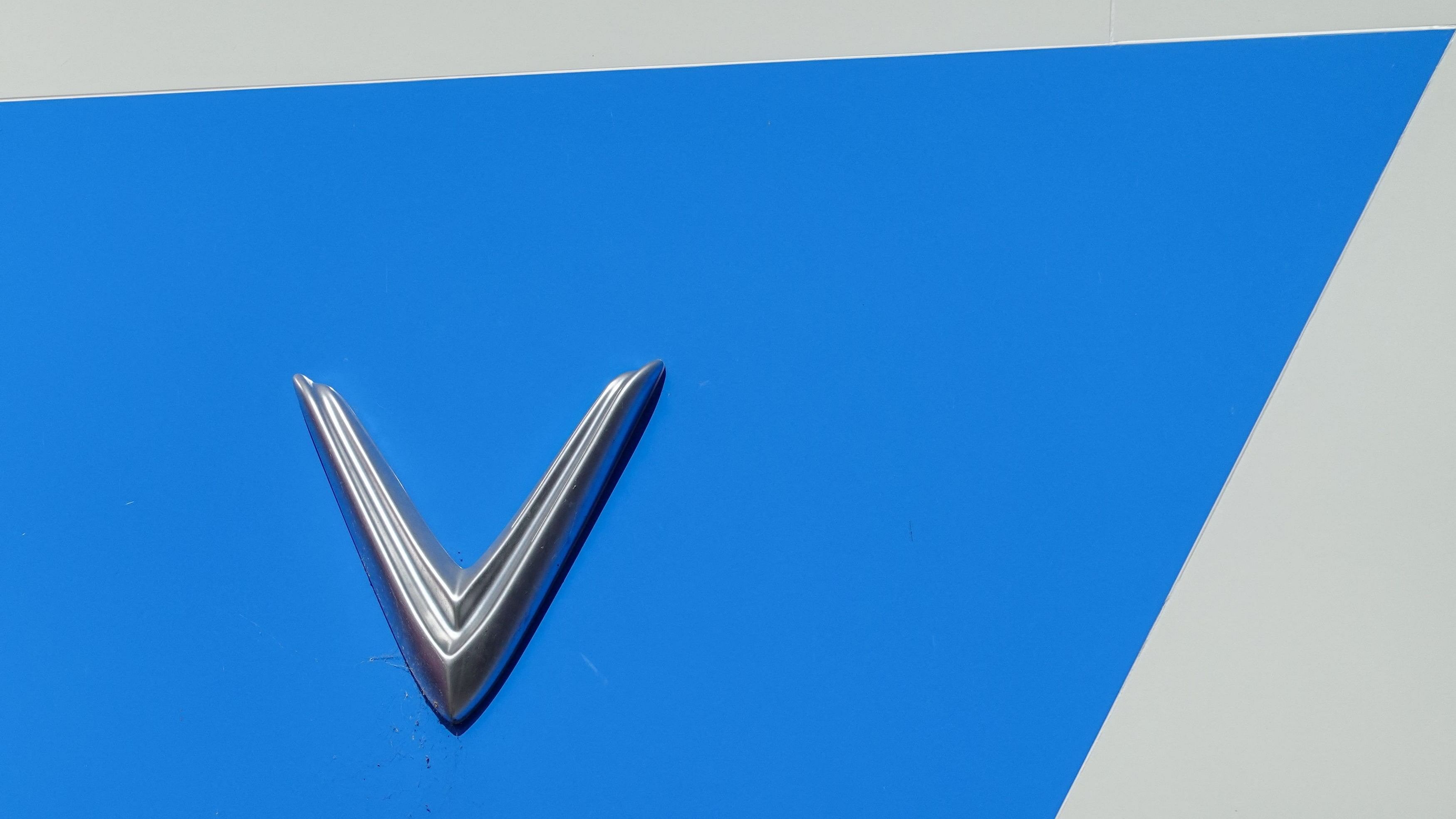 <div class="paragraphs"><p>A Vinfast electric vehicle logo is shown atop one of the company's retail locations in San Diego, California</p></div>