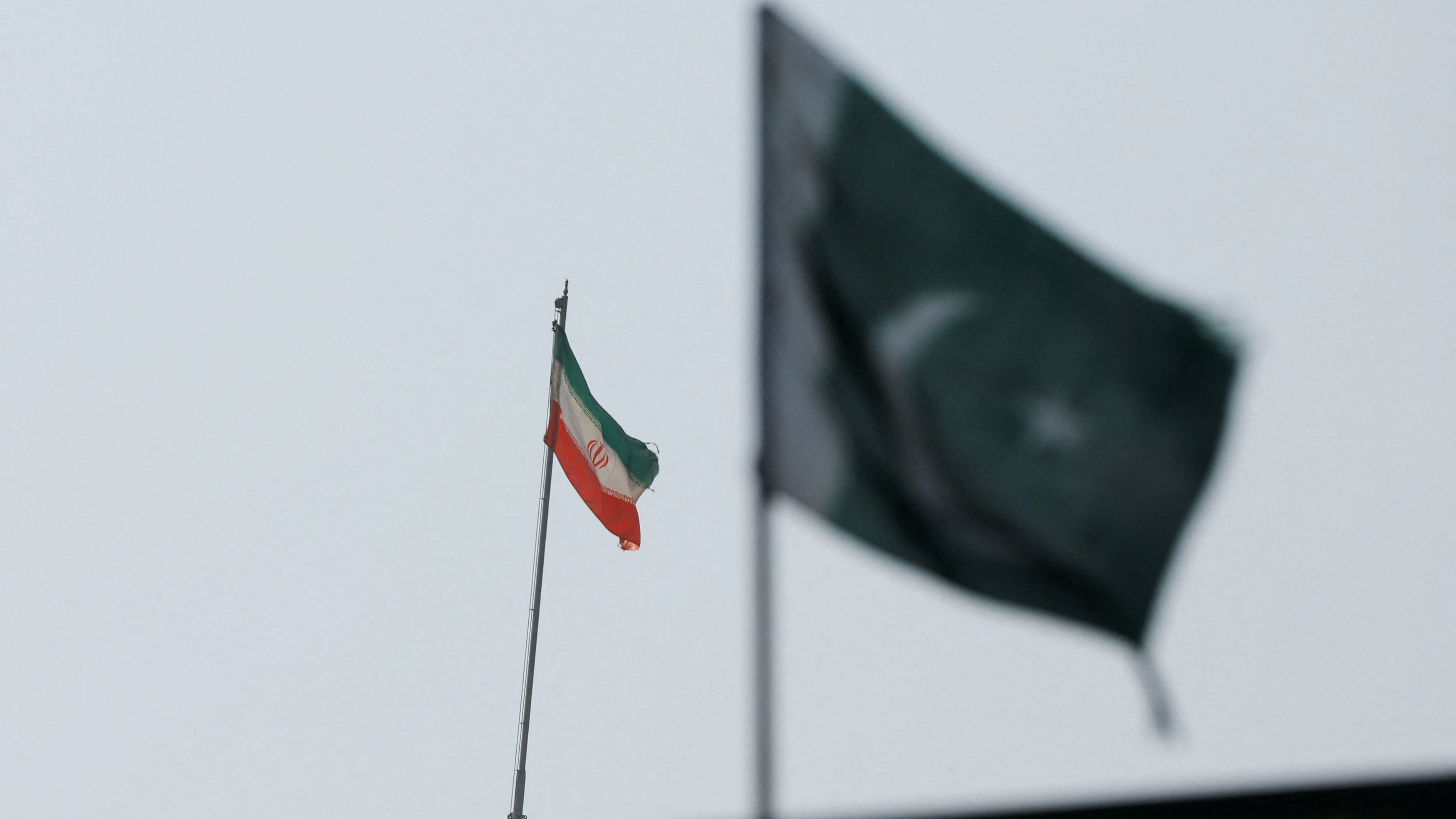 <div class="paragraphs"><p>The flag of Iran is seen over its consulate building, with Pakistan's flag in the foreground.</p></div>