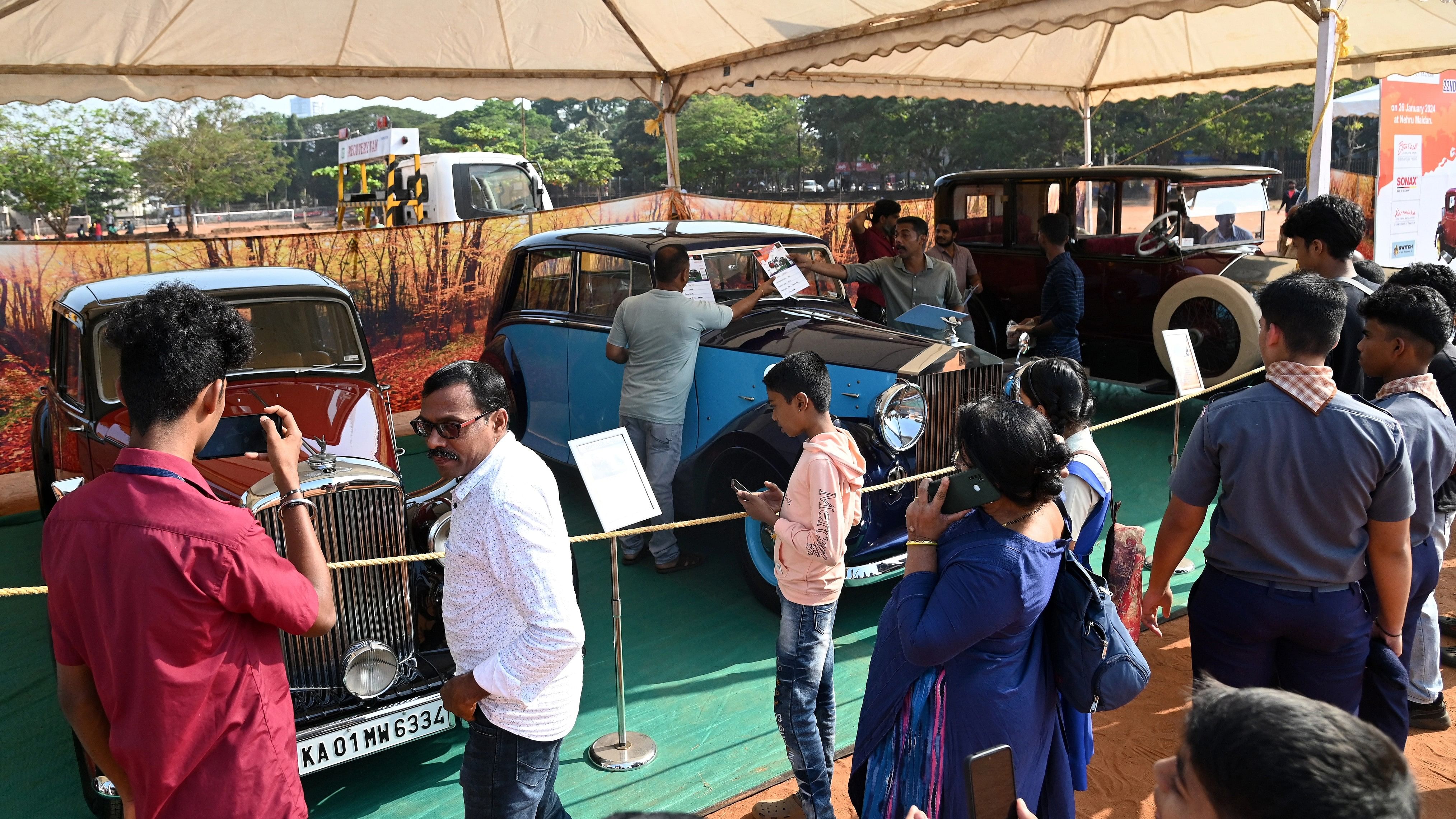 <div class="paragraphs"><p>Visitors having a look at the vintage cars at 22nd Vintage Classic Cars and Bikes Carnival’ organised by Mangalore Motorsport Association (MMA) at Nerhu Maidan as part of Republic Day celebrations on Friday.</p></div>