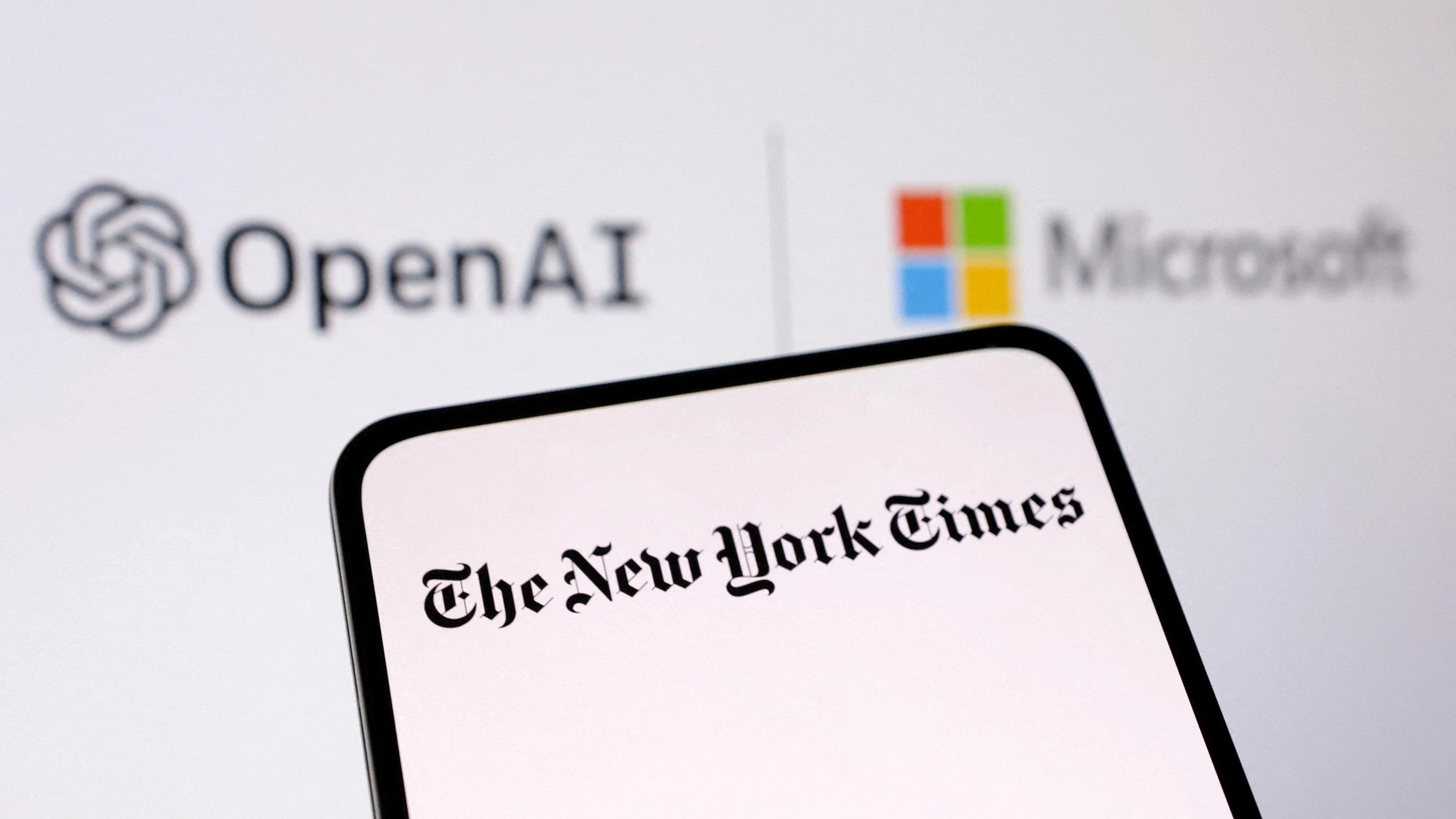 <div class="paragraphs"><p>OpenAI, Microsoft and The New York Times logos are seen in this illustration.&nbsp;</p></div>