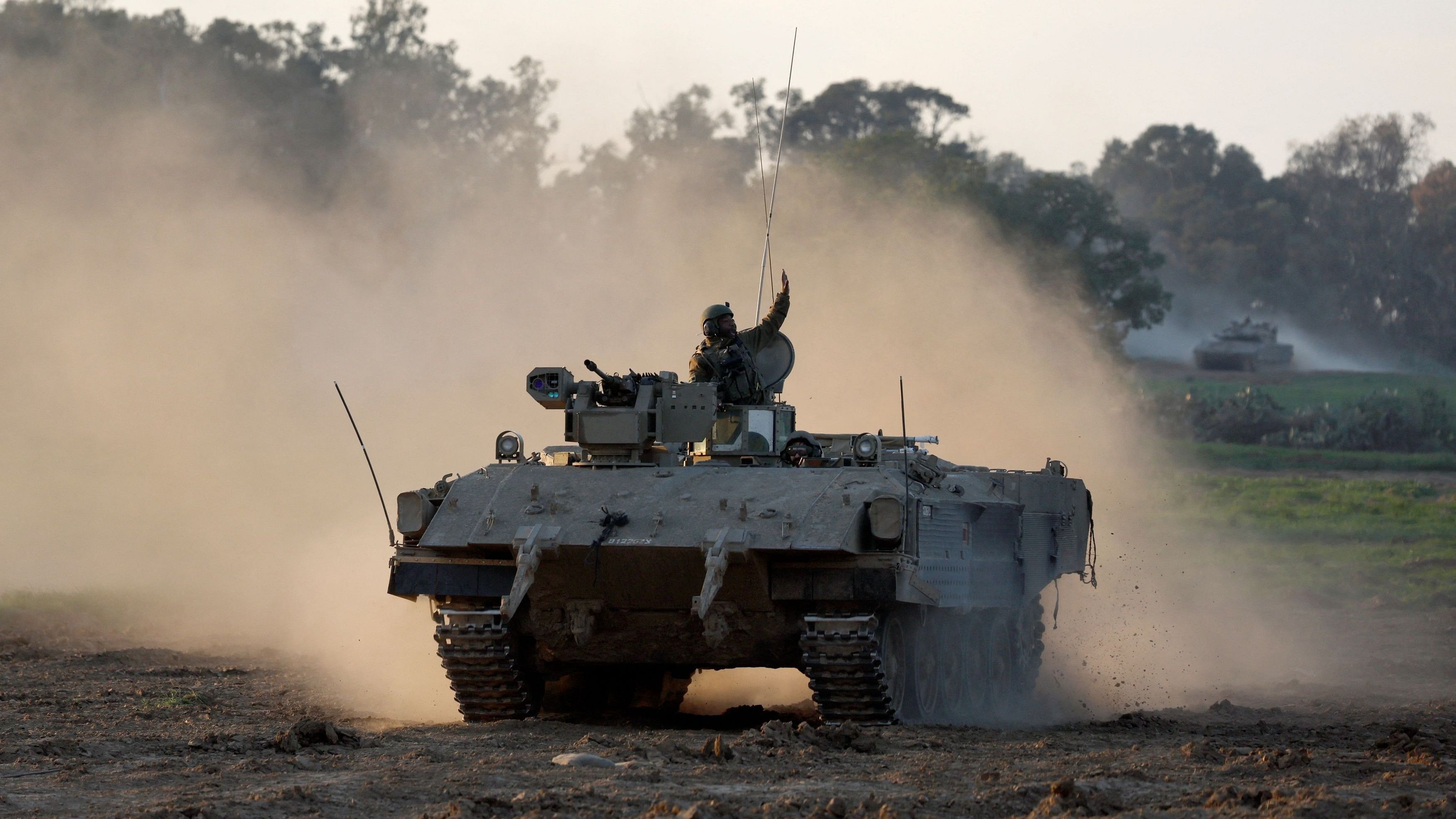 <div class="paragraphs"><p>An Israeli APC enters Israel from Gaza, amid the ongoing conflict between Israel and the Palestinian Islamist group Hamas, at the Israel-Gaza border, Israel, January 6, 2024. </p></div>
