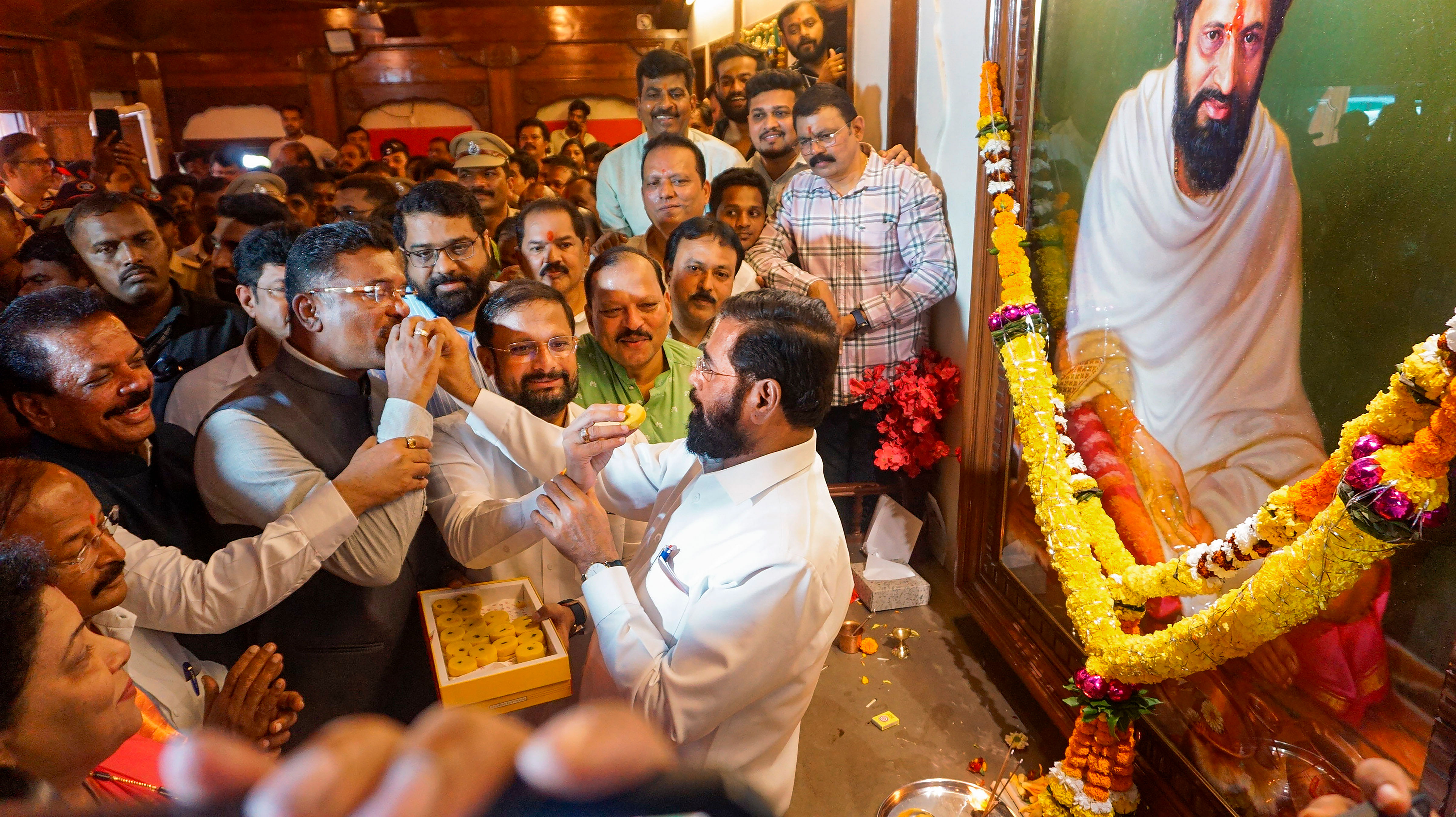 <div class="paragraphs"><p>Maharashtra Chief Minister Eknath Shinde with supporters during celebrations of Shiv Sena MLA disqualification case verdict, in Thane, Thursday, Jan. 11, 2024. Maharashtra Assembly Speaker Rahul Narwekar on Wednesday held that the Shiv Sena faction led by Shinde was the 'real political party' when rival groups emerged in June 2022, and did not disqualify any MLA from the two camps. </p></div>