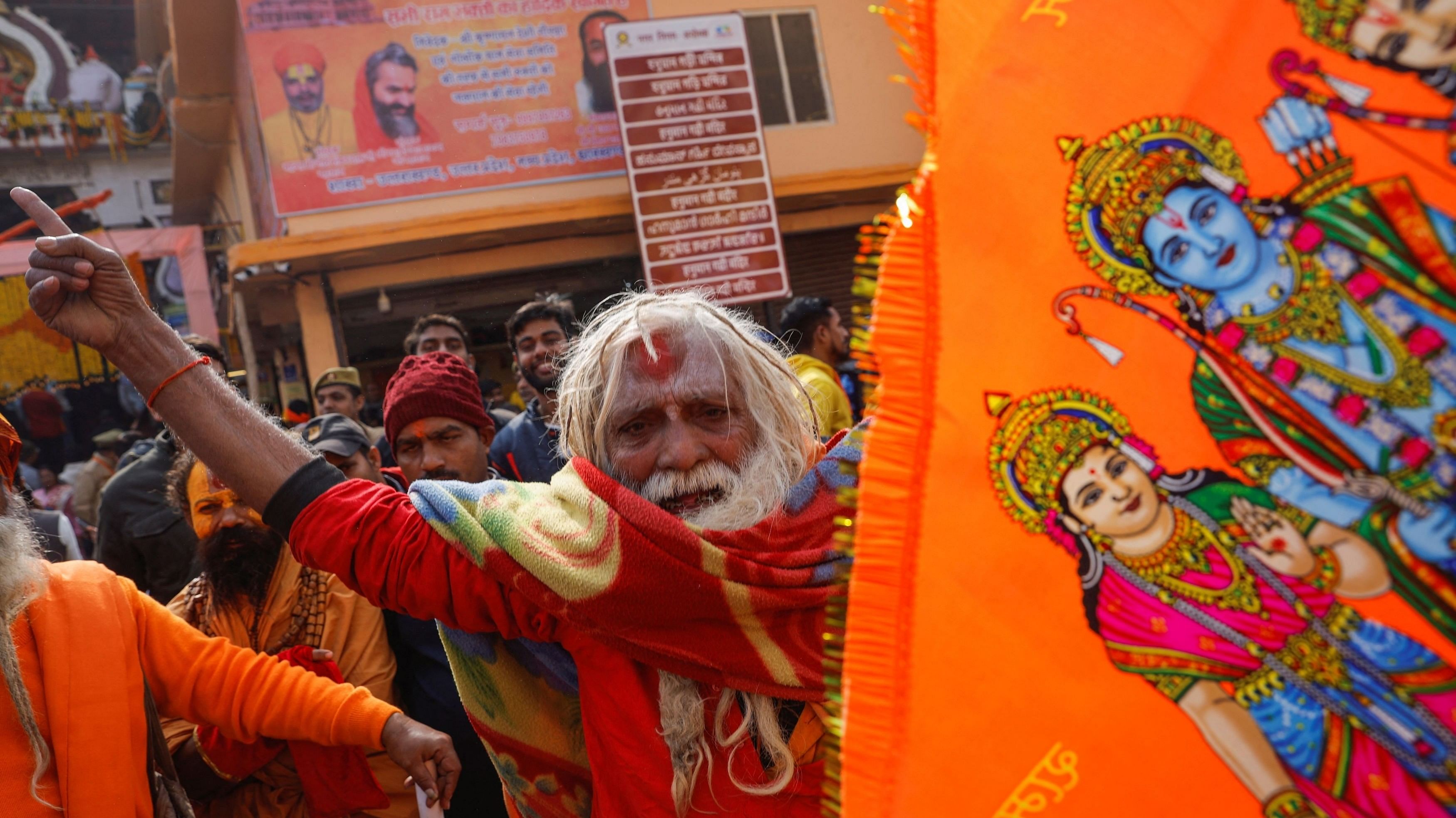 <div class="paragraphs"><p>Performers dressed in traditional attire perform during their rehearsal at a road-side on the eve of opening of the temple of Lord Ram in Ayodhya,.</p></div>