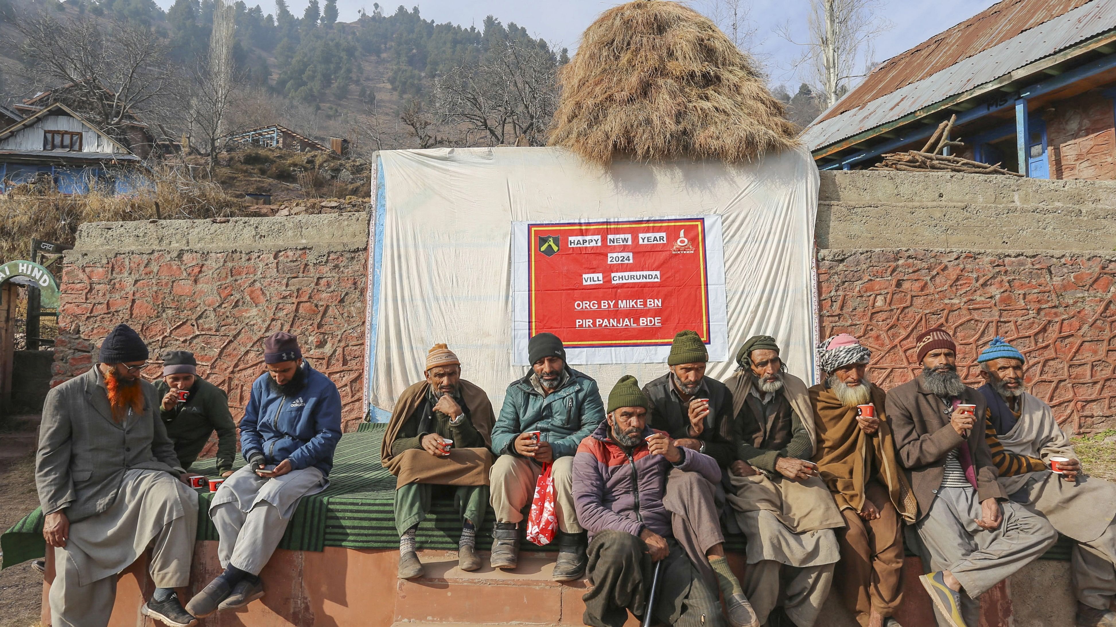 <div class="paragraphs"><p>Locals during celebrations of the new year with Indian Army, at Churunda village near the LoC in North Kashmir.</p></div>