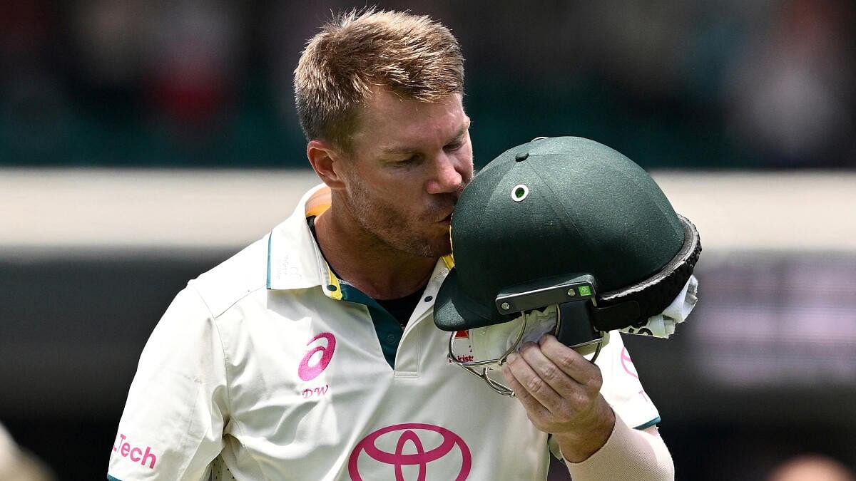 <div class="paragraphs"><p>Australia's David Warner kisses the coat of arms on his helmet as he leaves the field in his last test match after being dismissed by Pakistan.&nbsp;</p></div>