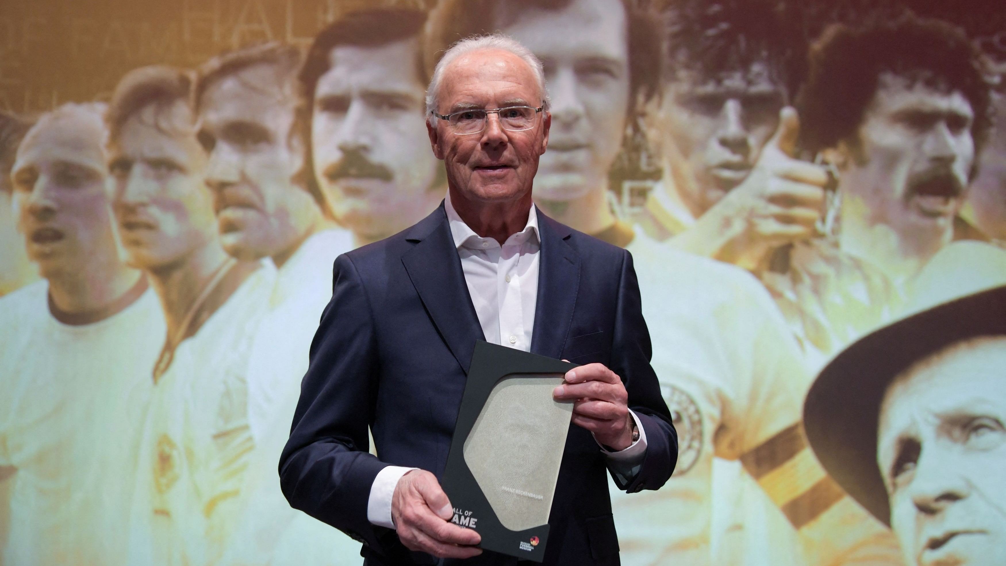 <div class="paragraphs"><p>German soccer legend Franz Beckenbauer poses after being included into the Hall of Fame, a permanent exhibition honouring German soccer legends at the German Football Museum in Dortmund, Germany, April 1, 2019.  </p></div>