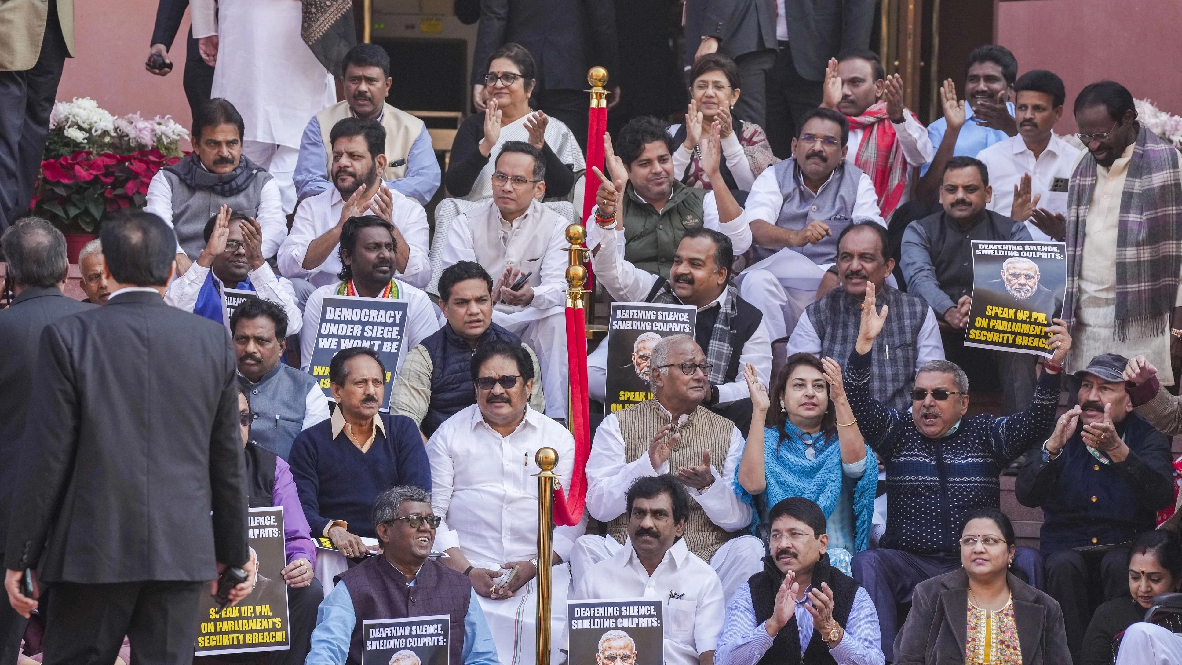 <div class="paragraphs"><p>Suspended Opposition MPs protest during the Winter session of Parliament, in New Delhi.</p></div>