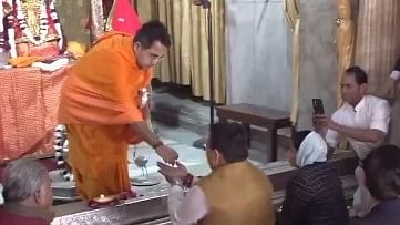 <div class="paragraphs"><p>Bhajanlal Sharma receives prasad at a temple.</p></div>