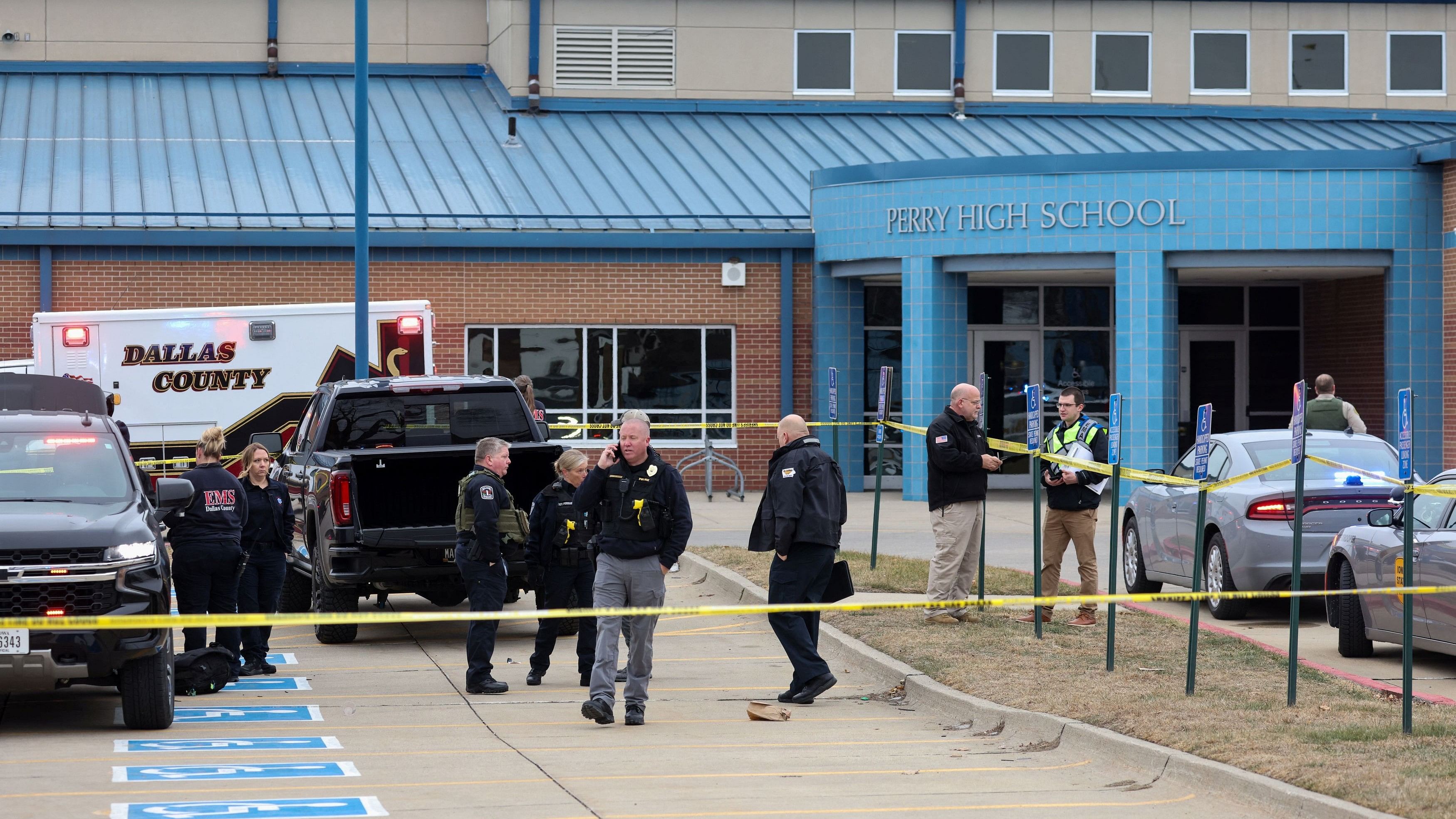 <div class="paragraphs"><p>Law enforcement officers work at the scene of a shooting at Perry High School in Perry, Iowa, US, January 4, 2024.</p></div>