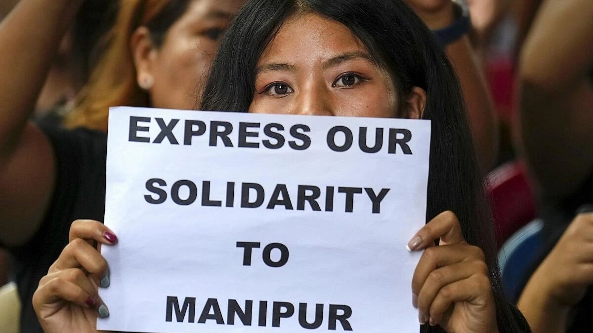 <div class="paragraphs"><p>Kuki community people from Manipur during a protest</p></div>