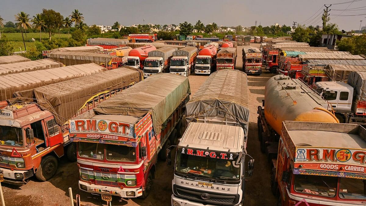 <div class="paragraphs"><p>Trucks parked at a depot following truck drivers' strike.</p></div>