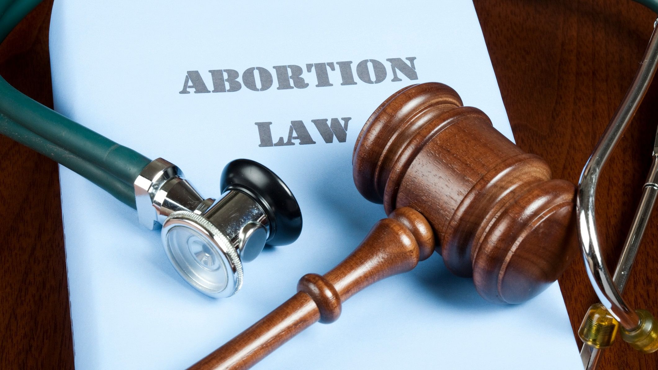 <div class="paragraphs"><p>Representative image of a gavel and stethoscope on Abortion law handbook.&nbsp;</p></div>